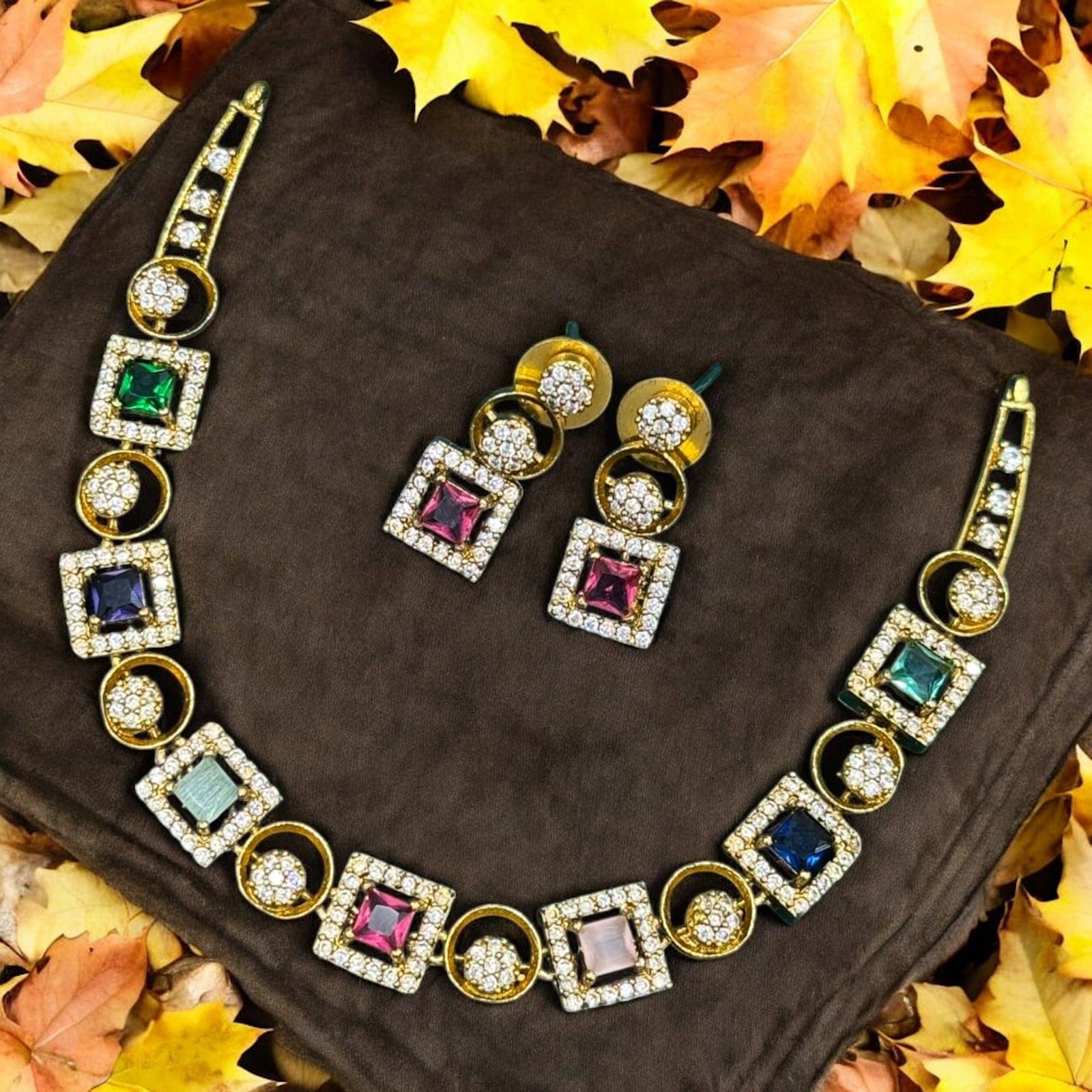     			KC JEWELS Multi Color Brass Necklace Set ( Pack of 1 )