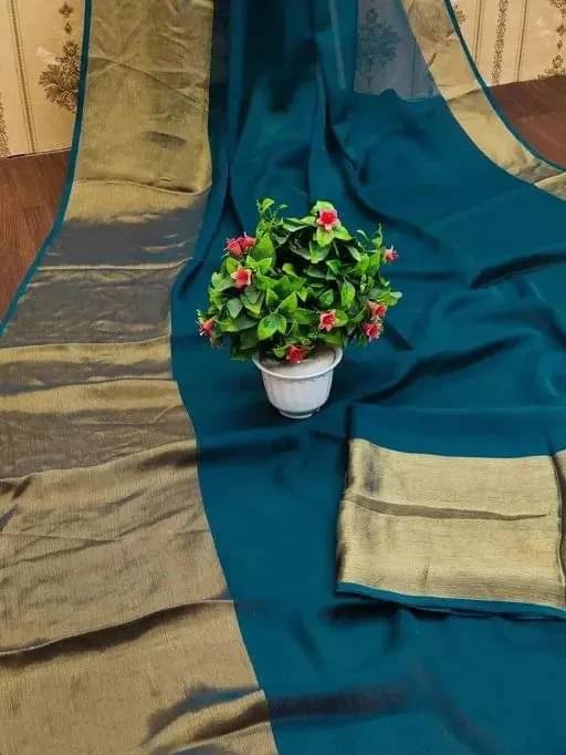 VRAGI Chiffon Solid Regular Saree With Unstitched Blouse Piece ( Light Blue ) VRAGI Chiffon Solid Regular Saree With Unstitched Blouse Piece ( Light Blue )