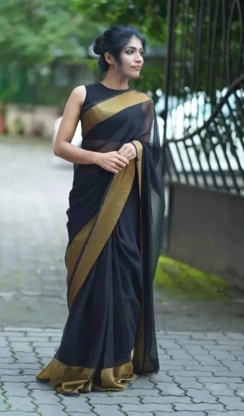 VRAGI Chiffon Solid Regular Saree With Unstitched Blouse Piece ( Black ) VRAGI Chiffon Solid Regular Saree With Unstitched Blouse Piece ( Black )