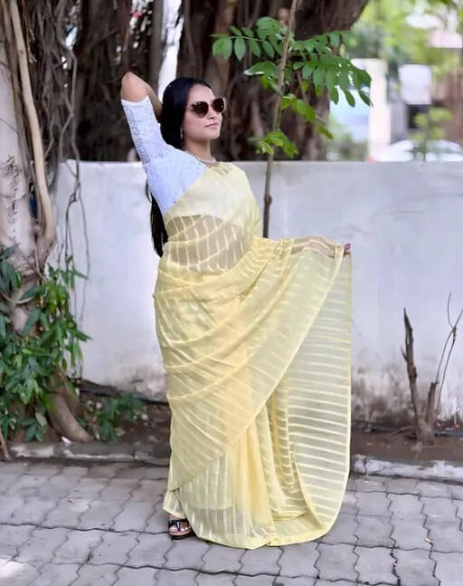     			VRAGI Georgette Woven Regular Saree With Unstitched Blouse Piece ( Yellow )