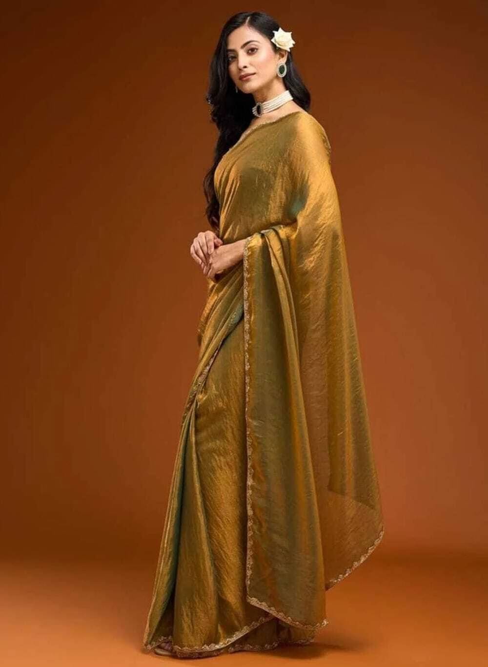 VRAGI Jimmy Choo Embellished Regular Saree With Unstitched Blouse Piece ( Gold ) VRAGI Jimmy Choo Embellished Regular Saree With Unstitched Blouse Piece ( Gold )