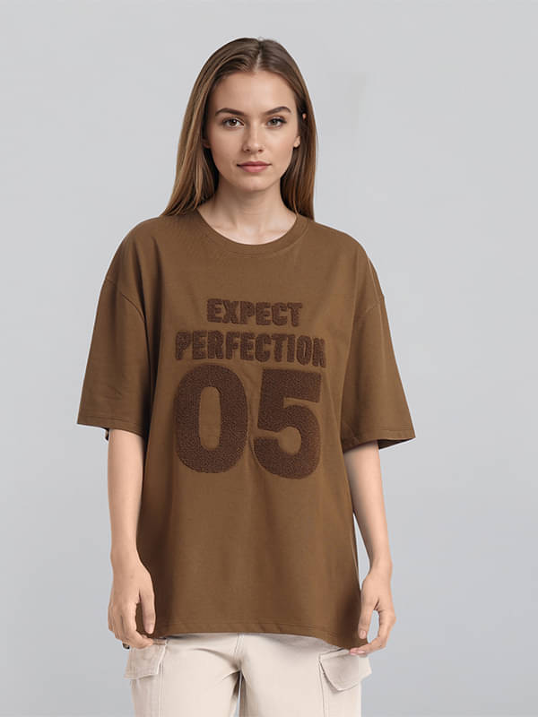     			Tokyo Talkies Women Cotton Blend Printed Oversized Fit Round Neck T-Shirt ( Brown )