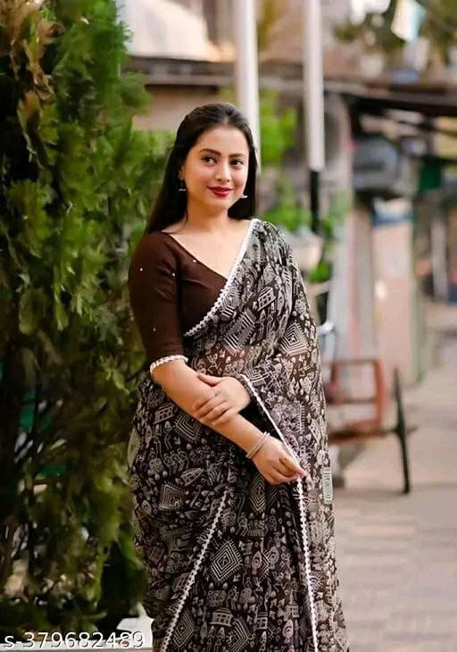 SAREEYA16 Georgette Printed Regular Saree With Unstitched Blouse Piece ( Brown ) SAREEYA16 Georgette Printed Regular Saree With Unstitched Blouse Piece ( Brown )