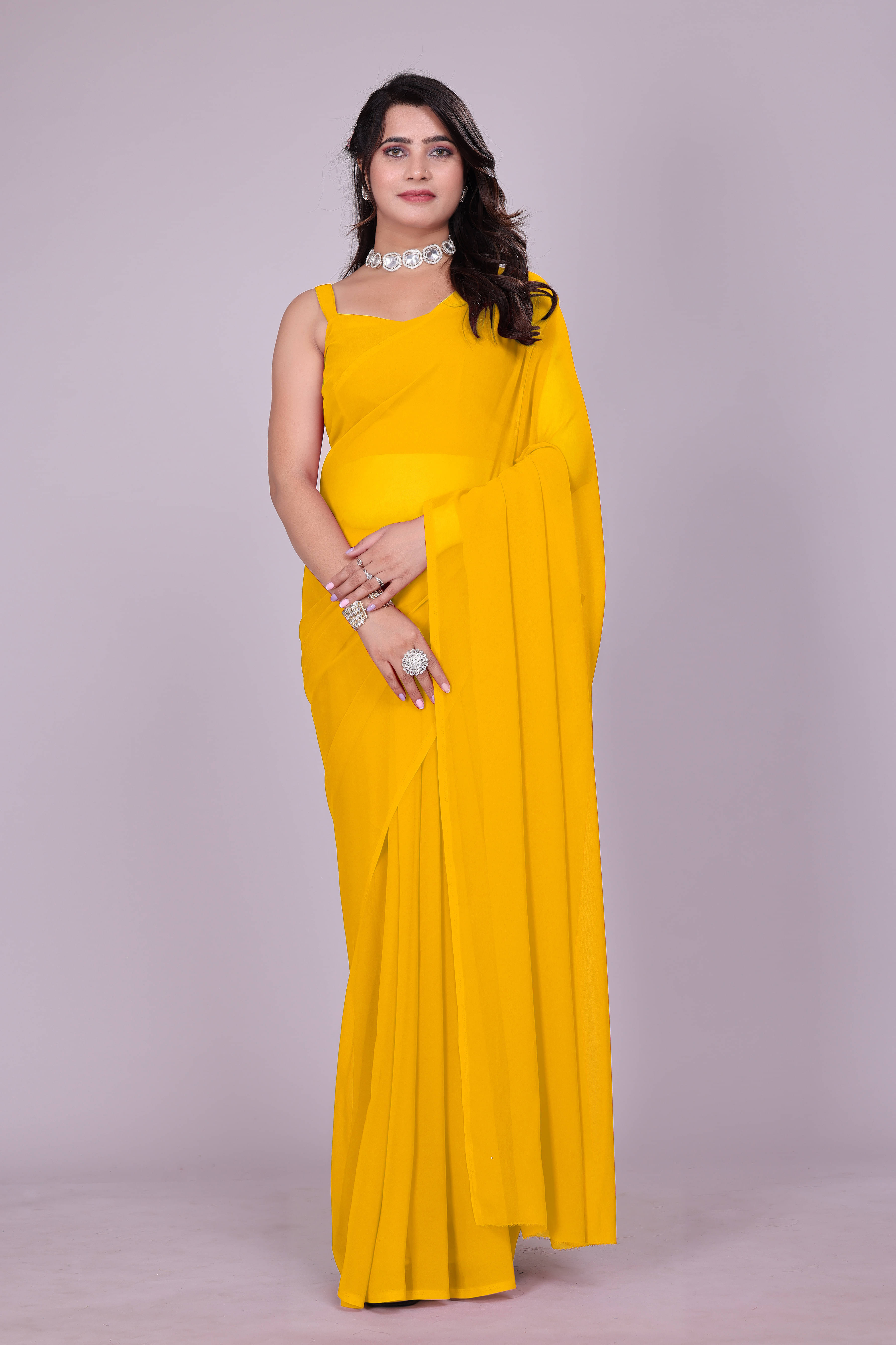 SAREEYA16 Georgette Solid Regular Saree With Unstitched Blouse Piece ( Yellow ) SAREEYA16 Georgette Solid Regular Saree With Unstitched Blouse Piece ( Yellow )