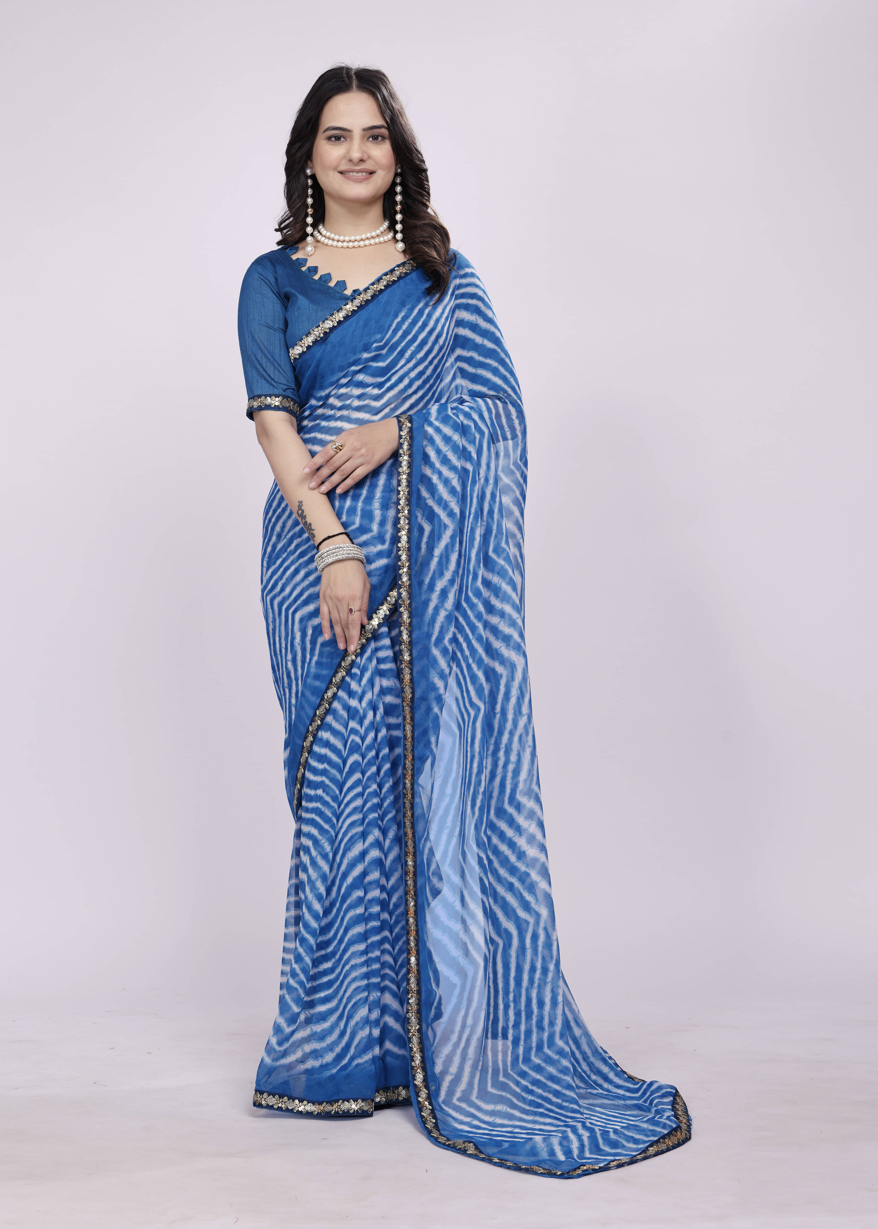     			SAREEYA16 Georgette Striped Regular Saree With Unstitched Blouse Piece ( Blue )