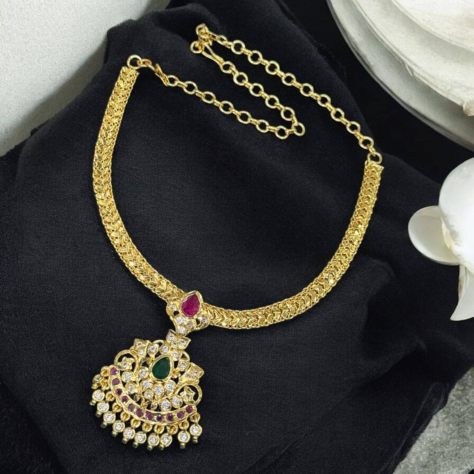     			KC JEWELS Multi Color Brass Necklace Set ( Pack of 1 )