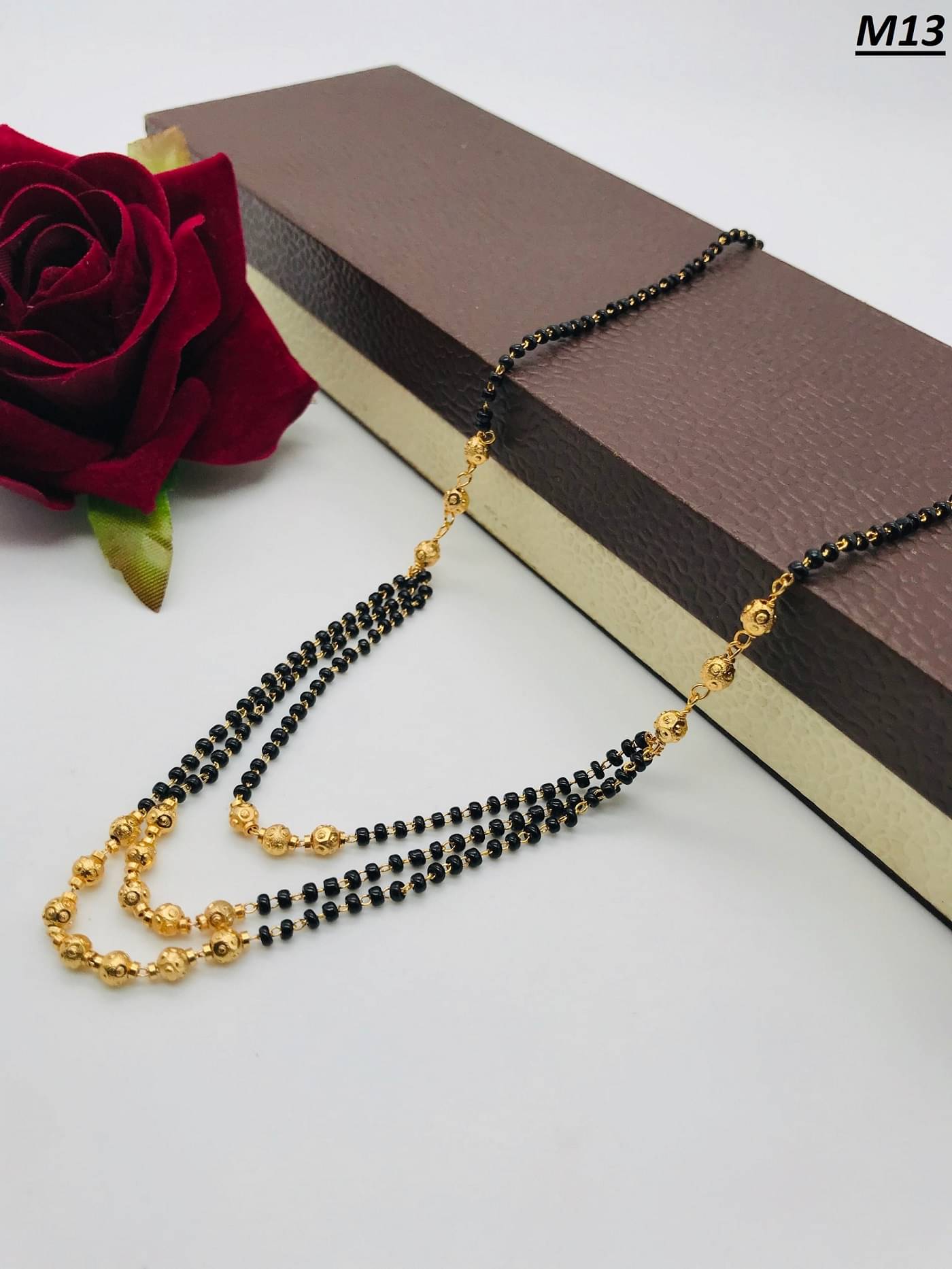 KIRTAN ENT Golden Mangalsutra ( Pack of 1 ) KIRTAN ENT Golden Mangalsutra ( Pack of 1 )