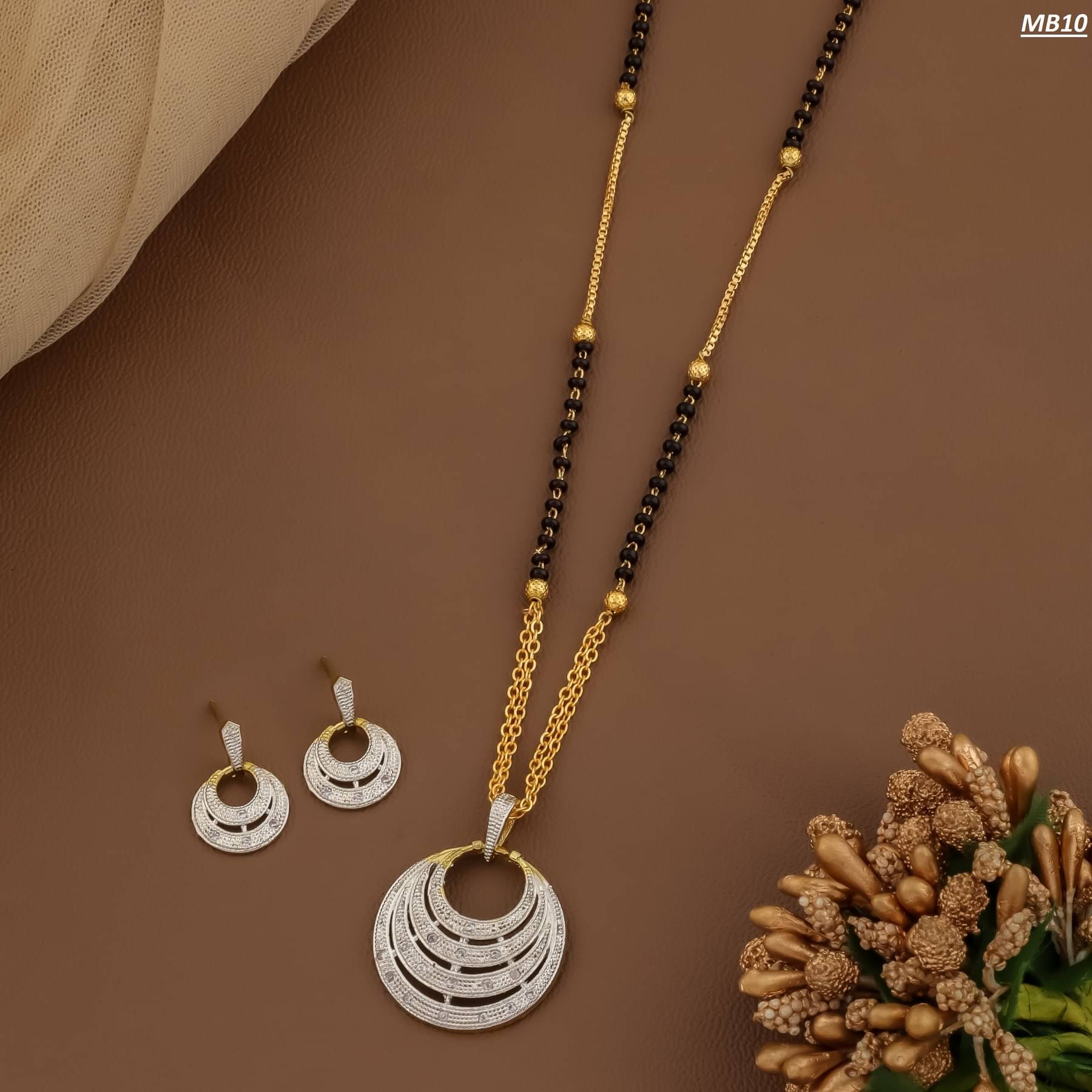     			KIRTAN ENT Golden Mangalsutra Set ( Pack of 1 )