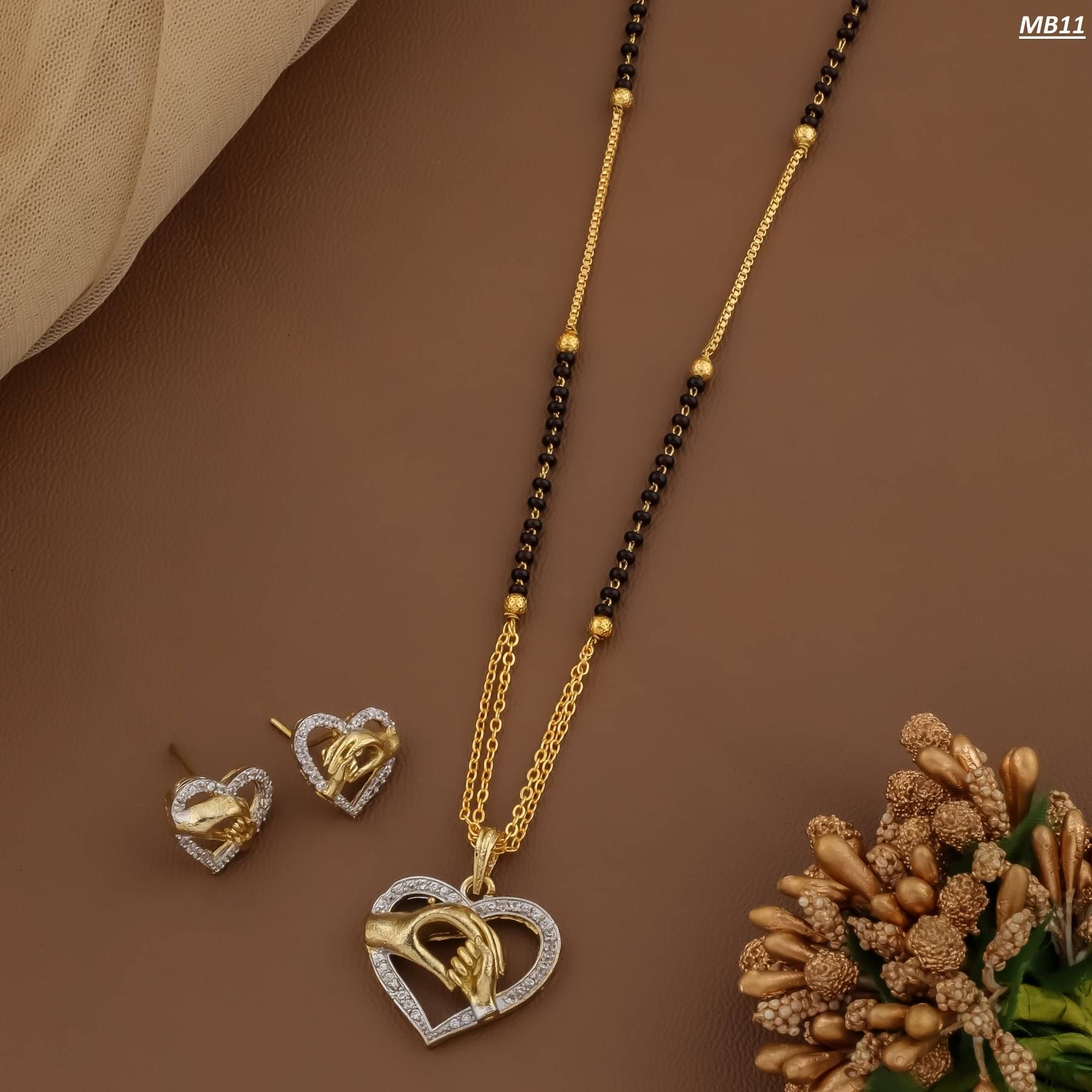     			KIRTAN ENT Golden Mangalsutra Set ( Pack of 1 )