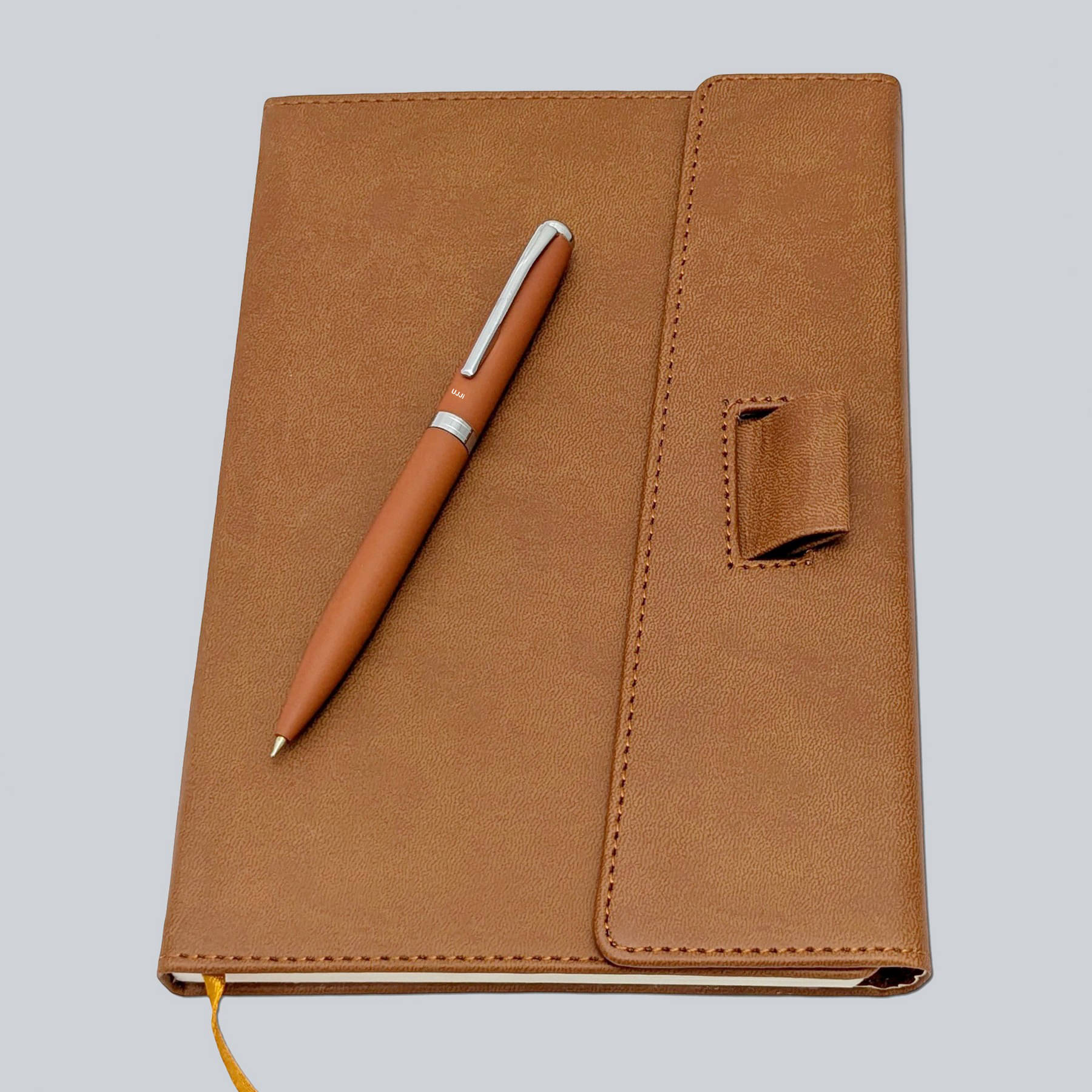 UJJi A5 Tan Professional Diary with Flap Closure and Pen Holder, 80GSM, 192 Pages comes with Pen UJJi A5 Tan Professional Diary with Flap Closure and Pen Holder, 80GSM, 192 Pages comes with Pen