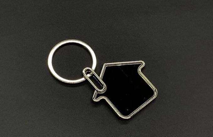     			Dharani Black Metal Keychain - Pack of 1