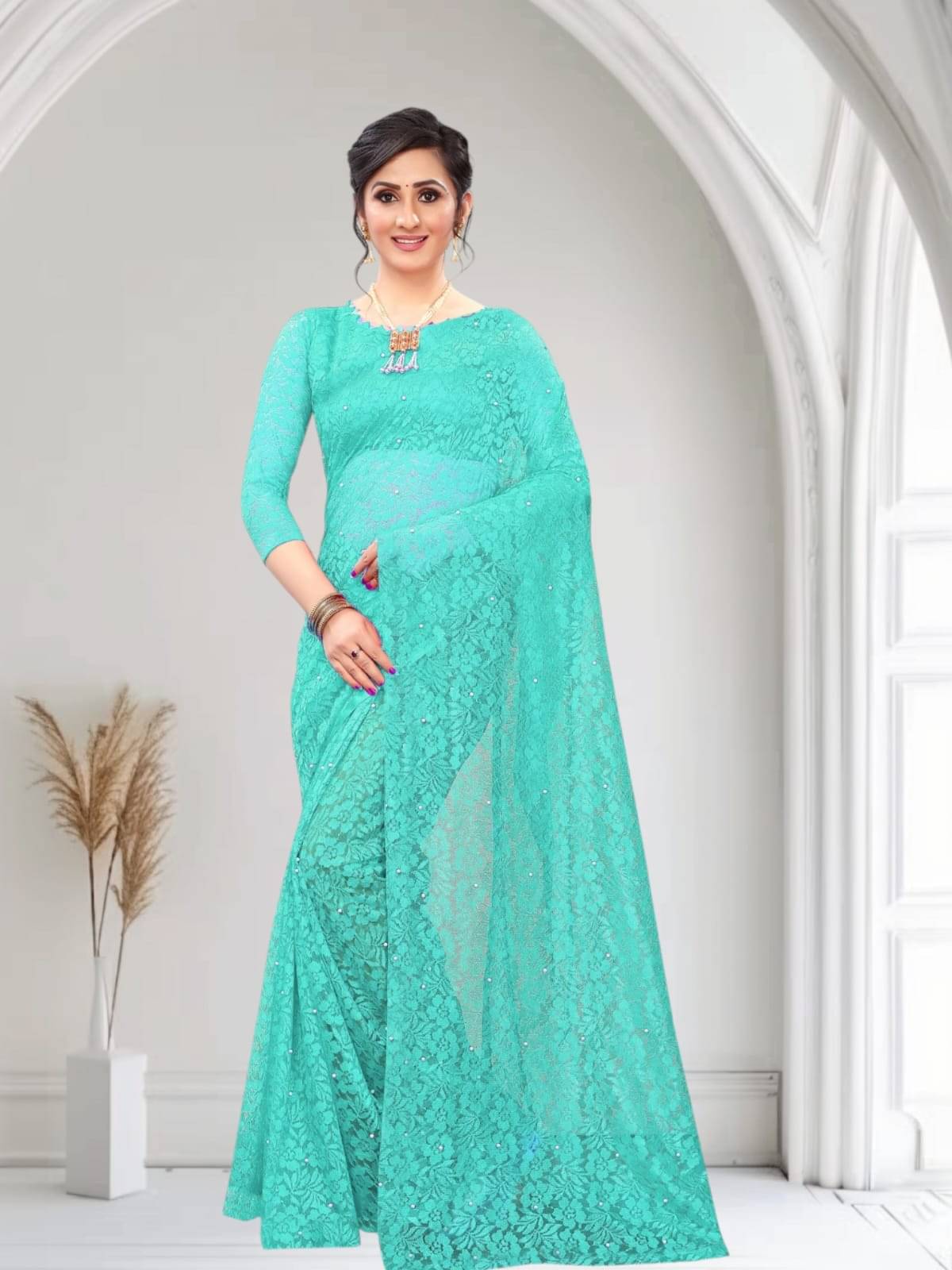 PALKAANO Net Solid Regular Saree With Unstitched Blouse Piece ( Sky Blue ) PALKAANO Net Solid Regular Saree With Unstitched Blouse Piece ( Sky Blue )