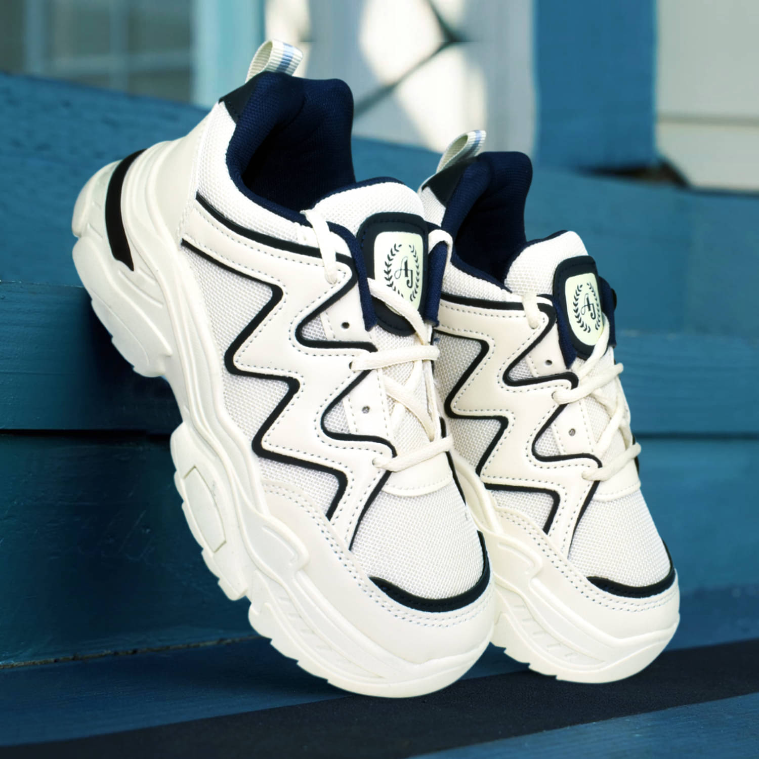     			Ajanta White Women's Sneakers