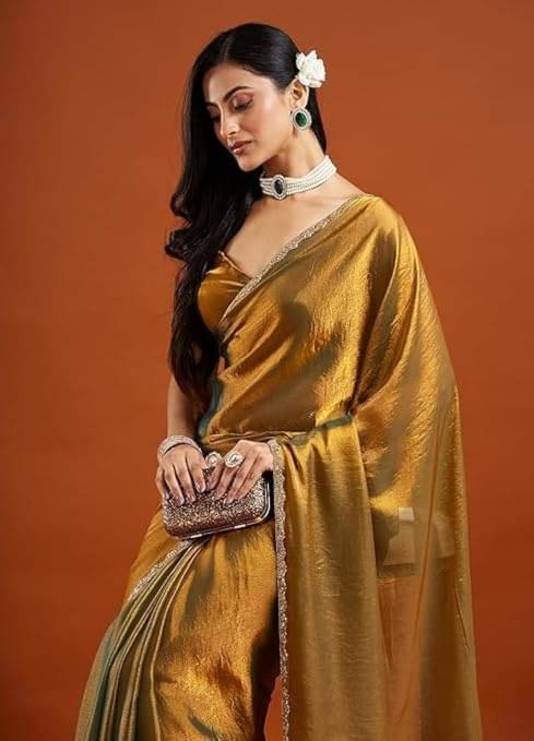 Madhav Art Chiffon Solid Regular Saree With Unstitched Blouse Piece ( Gold ) Madhav Art Chiffon Solid Regular Saree With Unstitched Blouse Piece ( Gold )