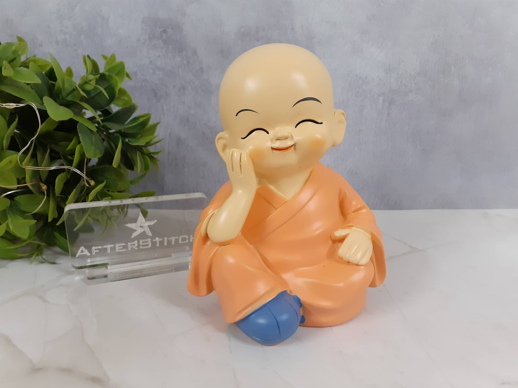 Spreading Smiles Resting Buddha Showpiece 14 cm - Pack of 1 Spreading Smiles Resting Buddha Showpiece 14 cm - Pack of 1