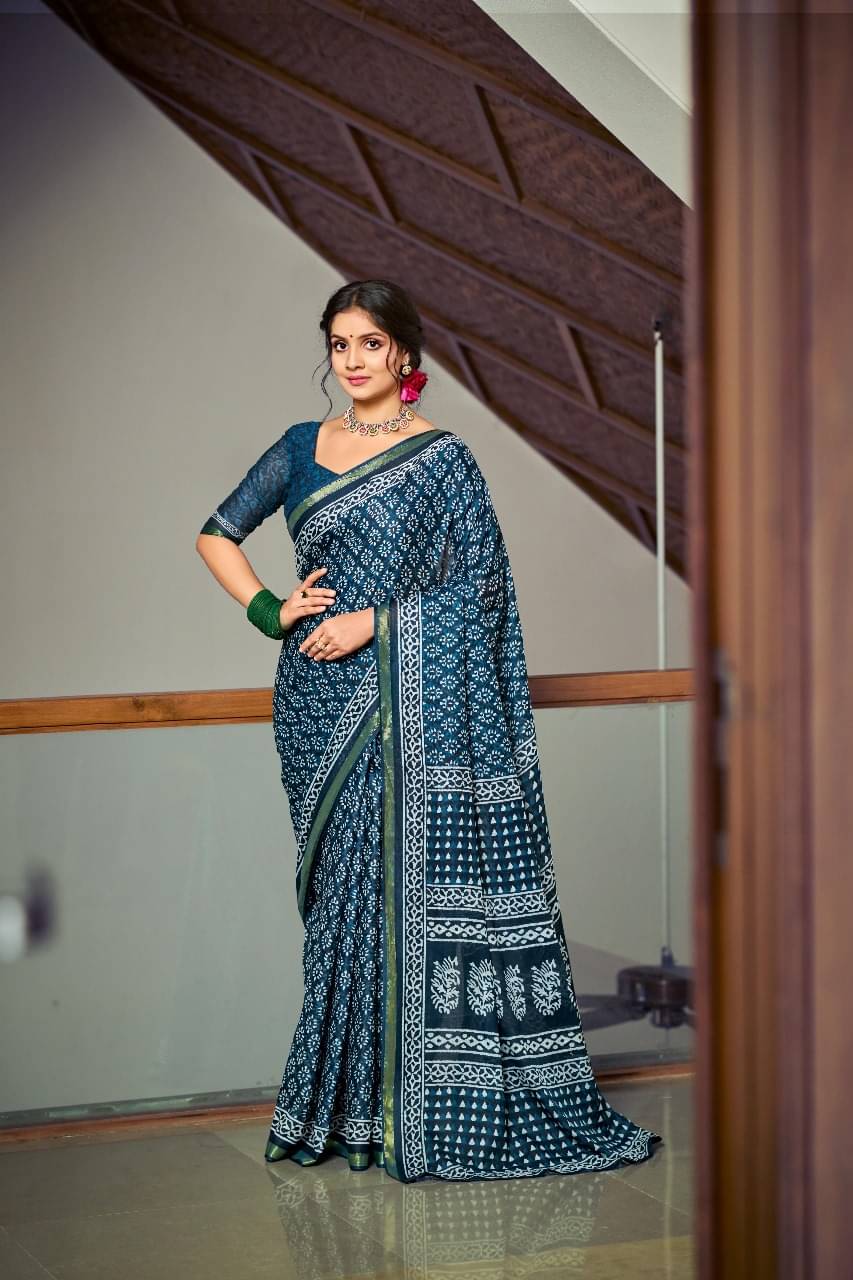 Vasu Creation Cotton Printed Regular Saree With Unstitched Blouse Piece ( Blue ) Vasu Creation Cotton Printed Regular Saree With Unstitched Blouse Piece ( Blue )