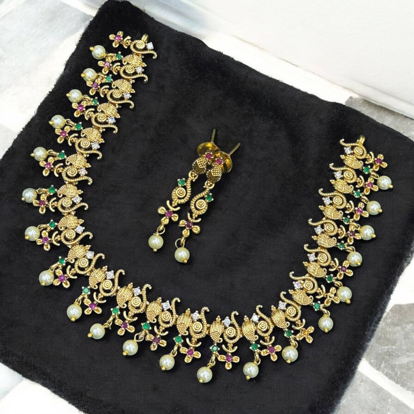     			charming luxe jewels Multi Color Brass Necklace Set ( Pack of 1 )