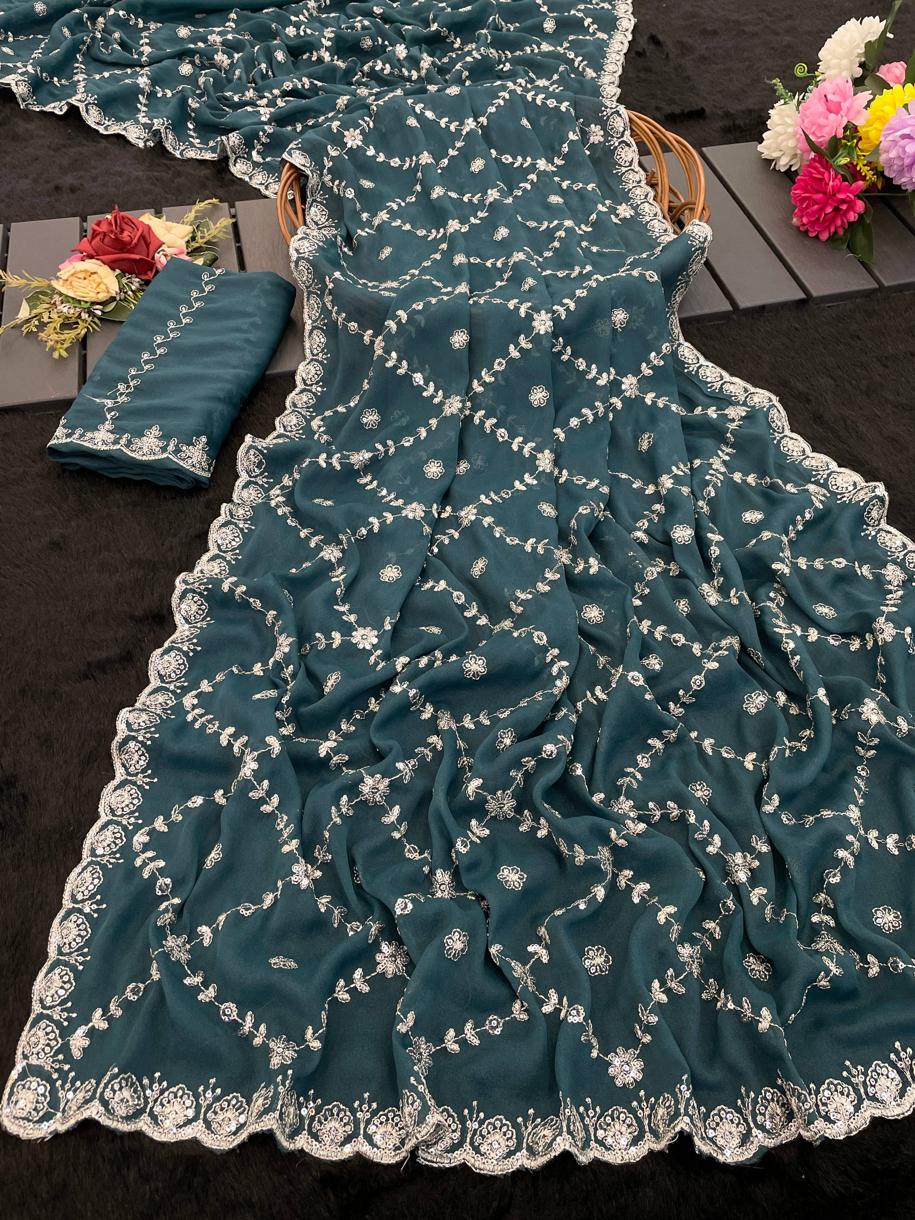 THE STYLE CLUB Georgette Embroidered Regular Saree With Unstitched Blouse Piece ( Blue ) THE STYLE CLUB Georgette Embroidered Regular Saree With Unstitched Blouse Piece ( Blue )