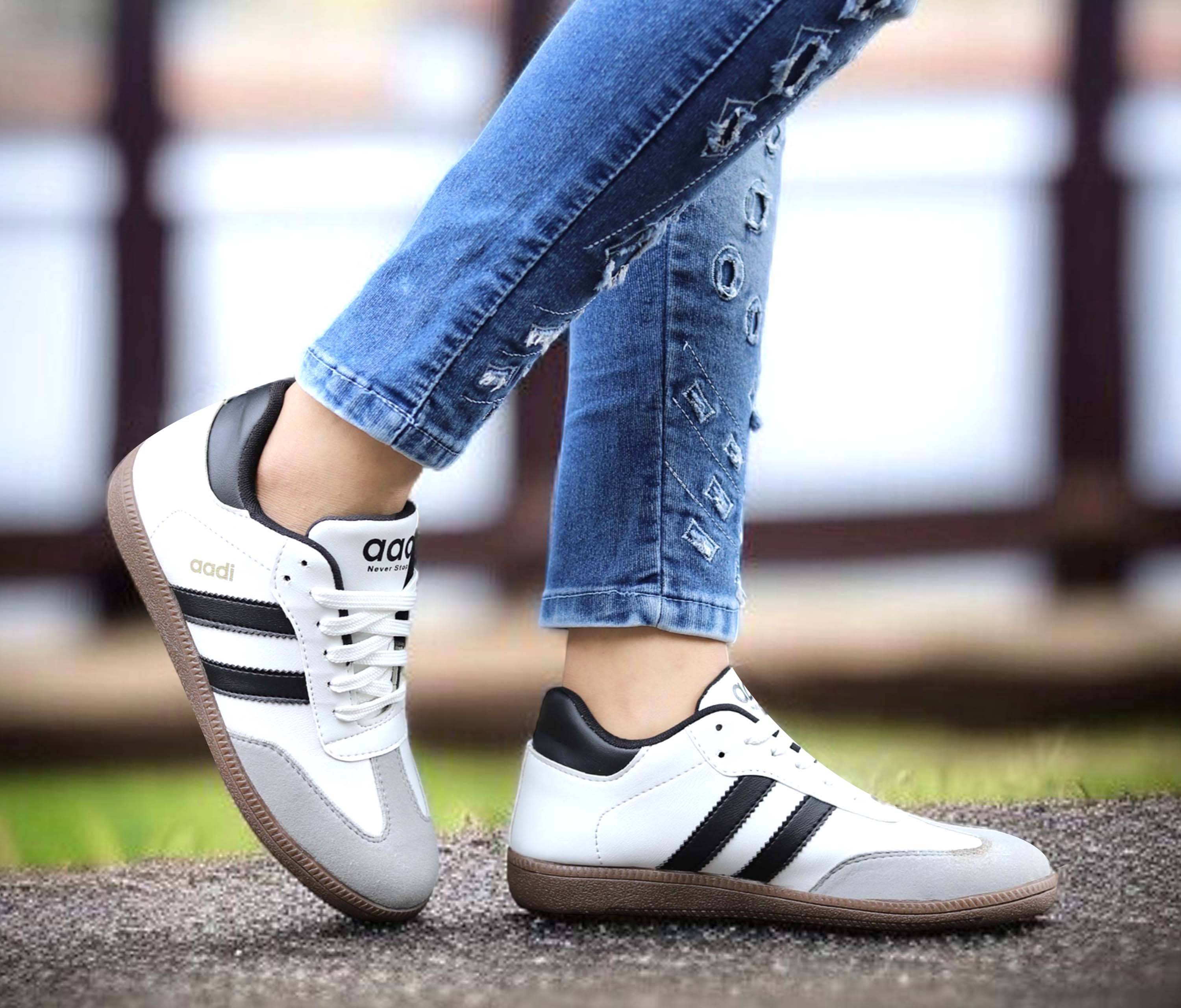     			Aadi White Women's Sneakers