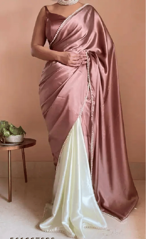 PALKAANO Satin Solid Regular Saree With Unstitched Blouse Piece ( Peach ) PALKAANO Satin Solid Regular Saree With Unstitched Blouse Piece ( Peach )