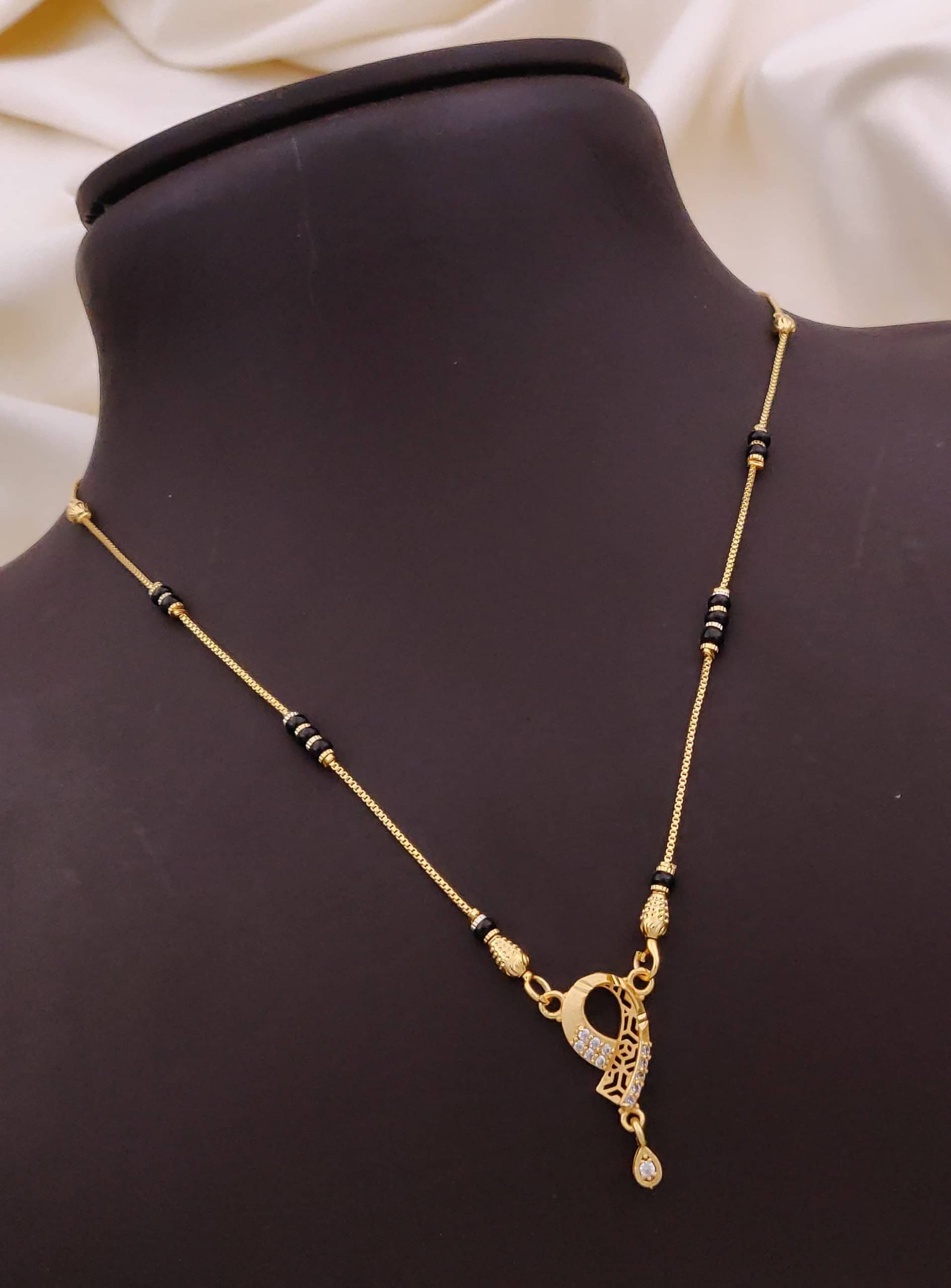 Shivay Fashion hub Golden Mangalsutra ( Pack of 1 ) Shivay Fashion hub Golden Mangalsutra ( Pack of 1 )