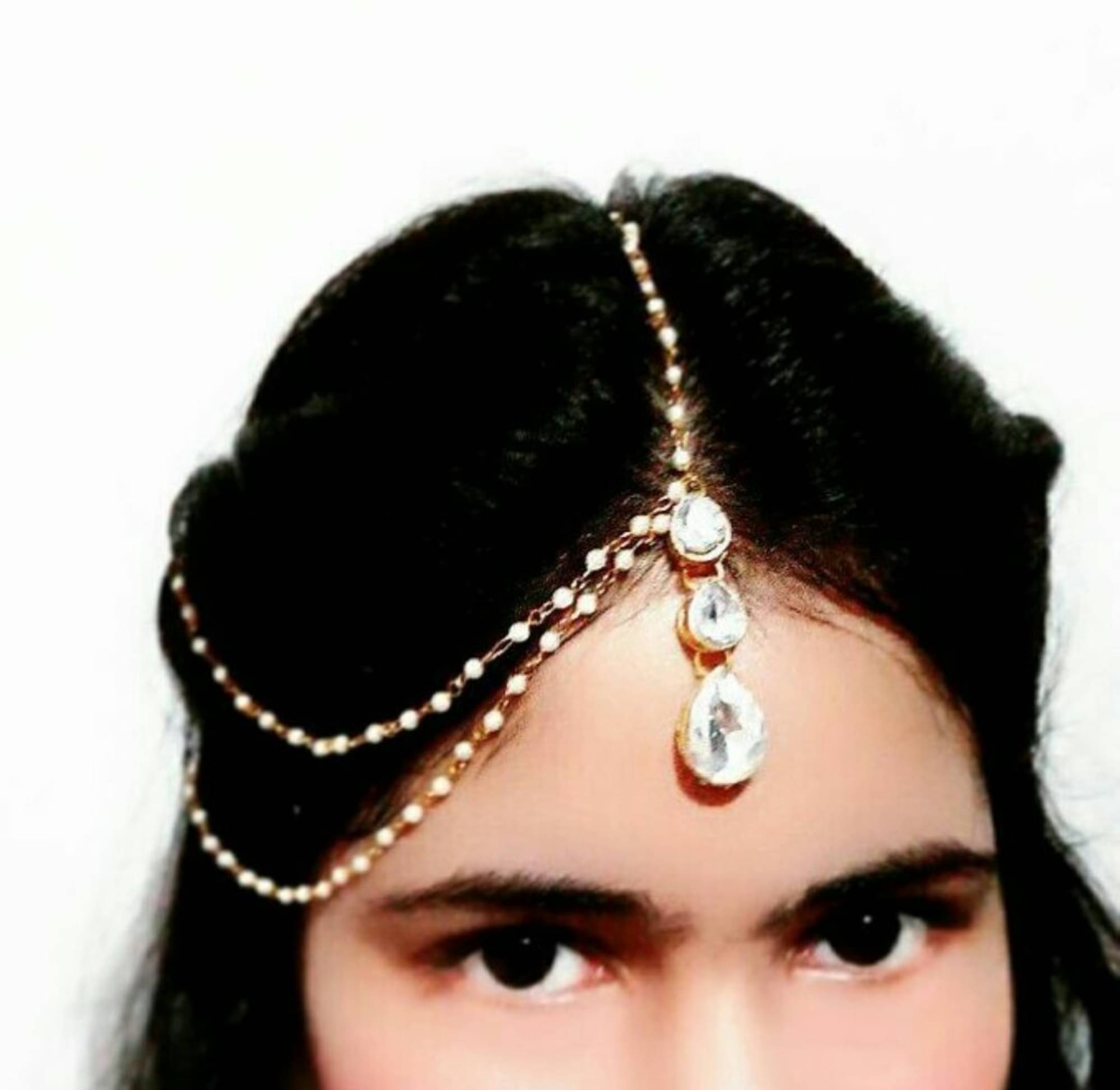 JN HANDICEAFT White Maang Tikka ( Pack of 1 ) JN HANDICEAFT White Maang Tikka ( Pack of 1 )