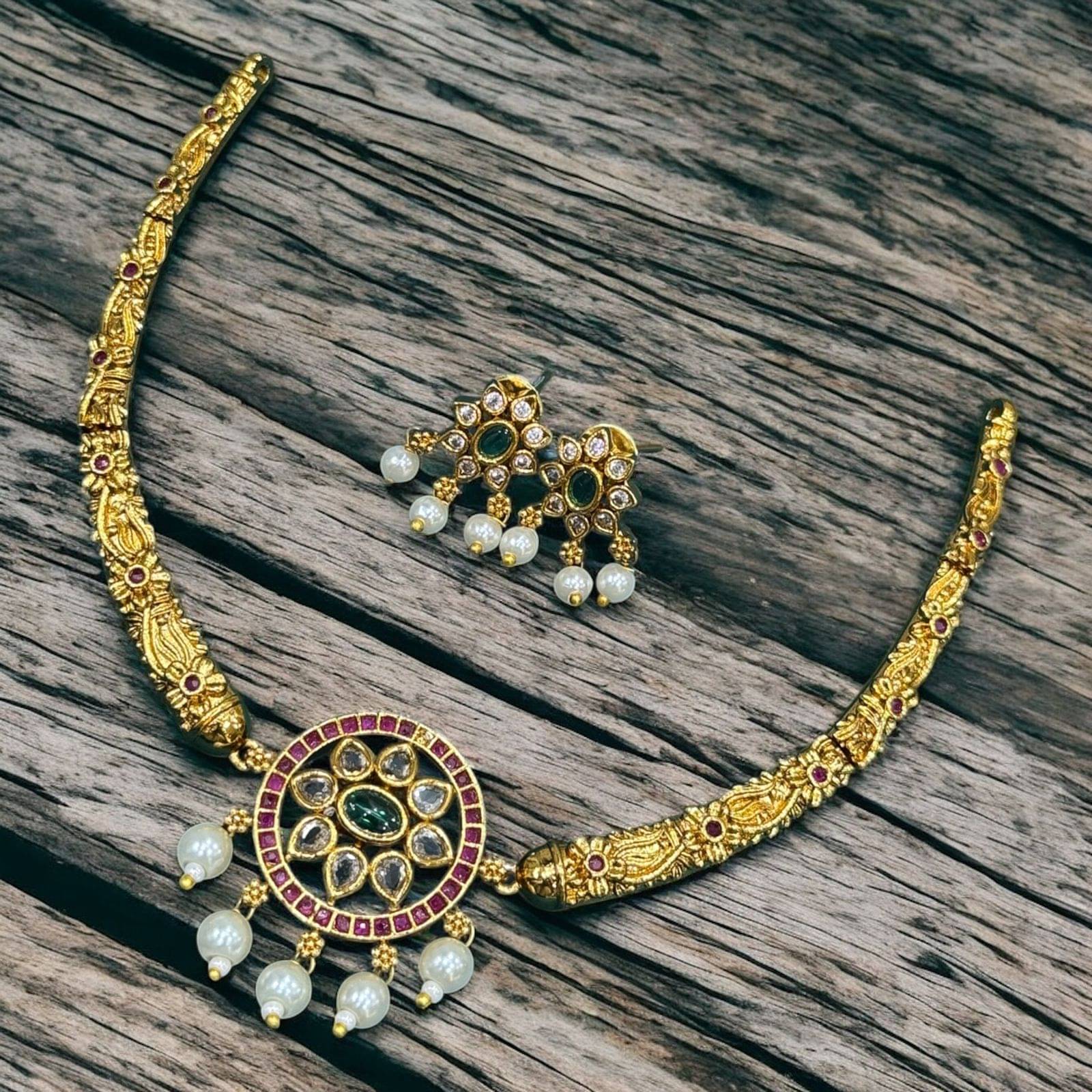     			KC JEWELS Multi Color Brass Necklace Set ( Pack of 1 )
