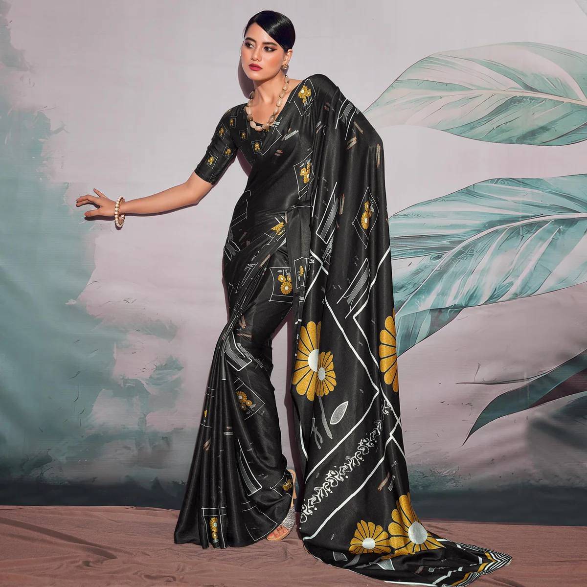Tasmi Tex Satin Printed Regular Saree With Unstitched Blouse Piece ( Black ) Tasmi Tex Satin Printed Regular Saree With Unstitched Blouse Piece ( Black )
