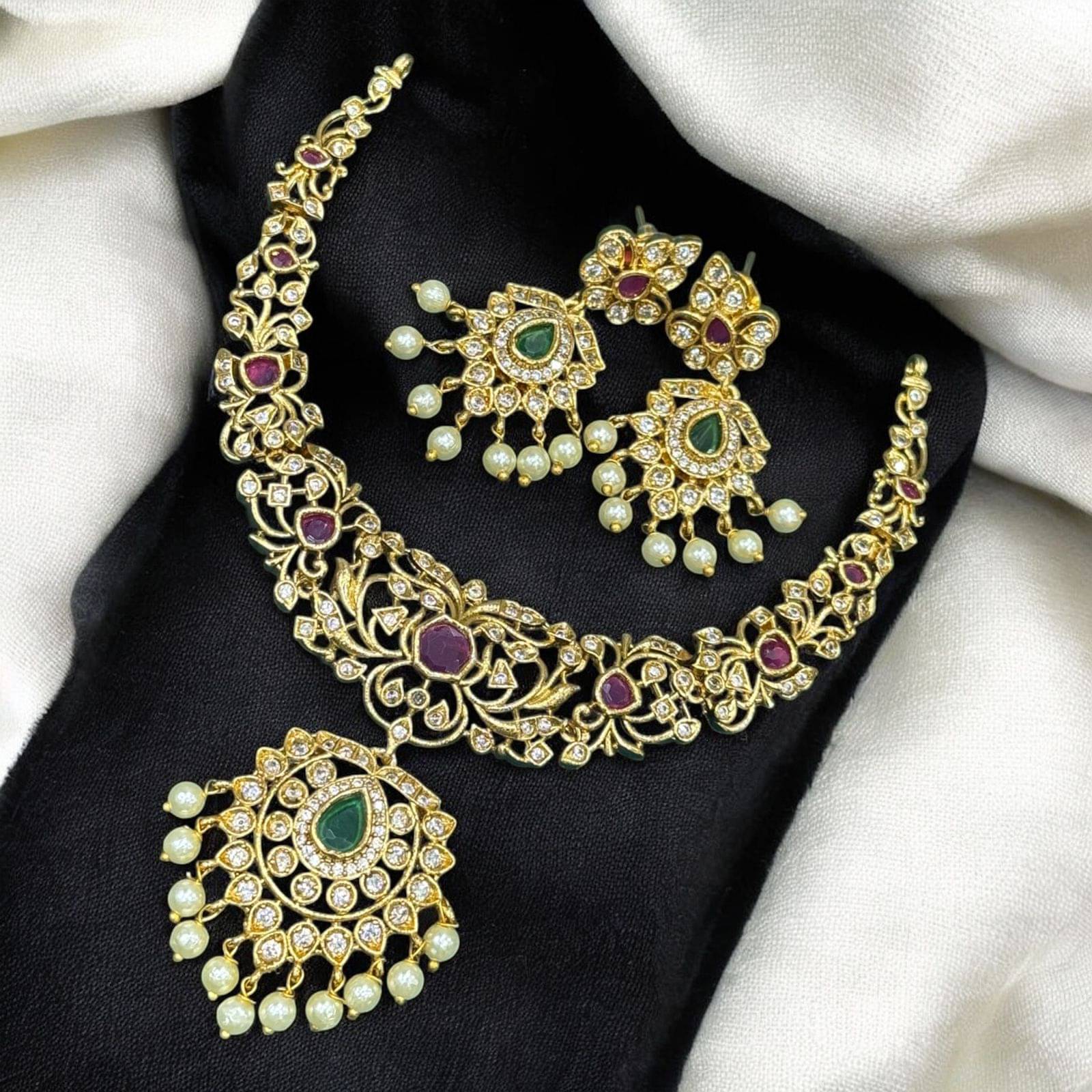 charming luxe jewels Multi Color Brass Necklace Set ( Pack of 1 ) charming luxe jewels Multi Color Brass Necklace Set ( Pack of 1 )