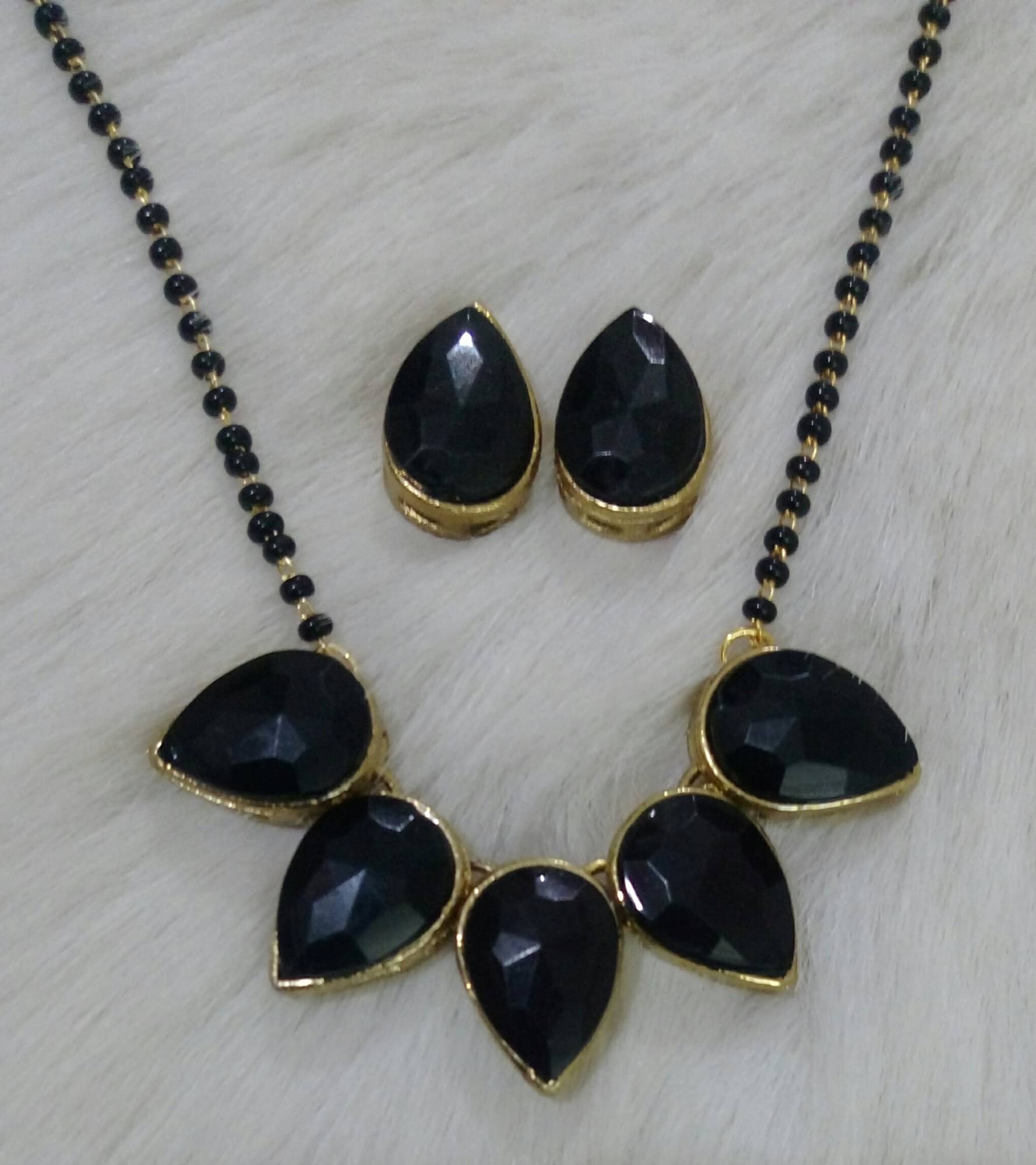 JN HANDICEAFT Black Mangalsutra Set ( Pack of 1 )     			JN HANDICEAFT Black Mangalsutra Set ( Pack of 1 )