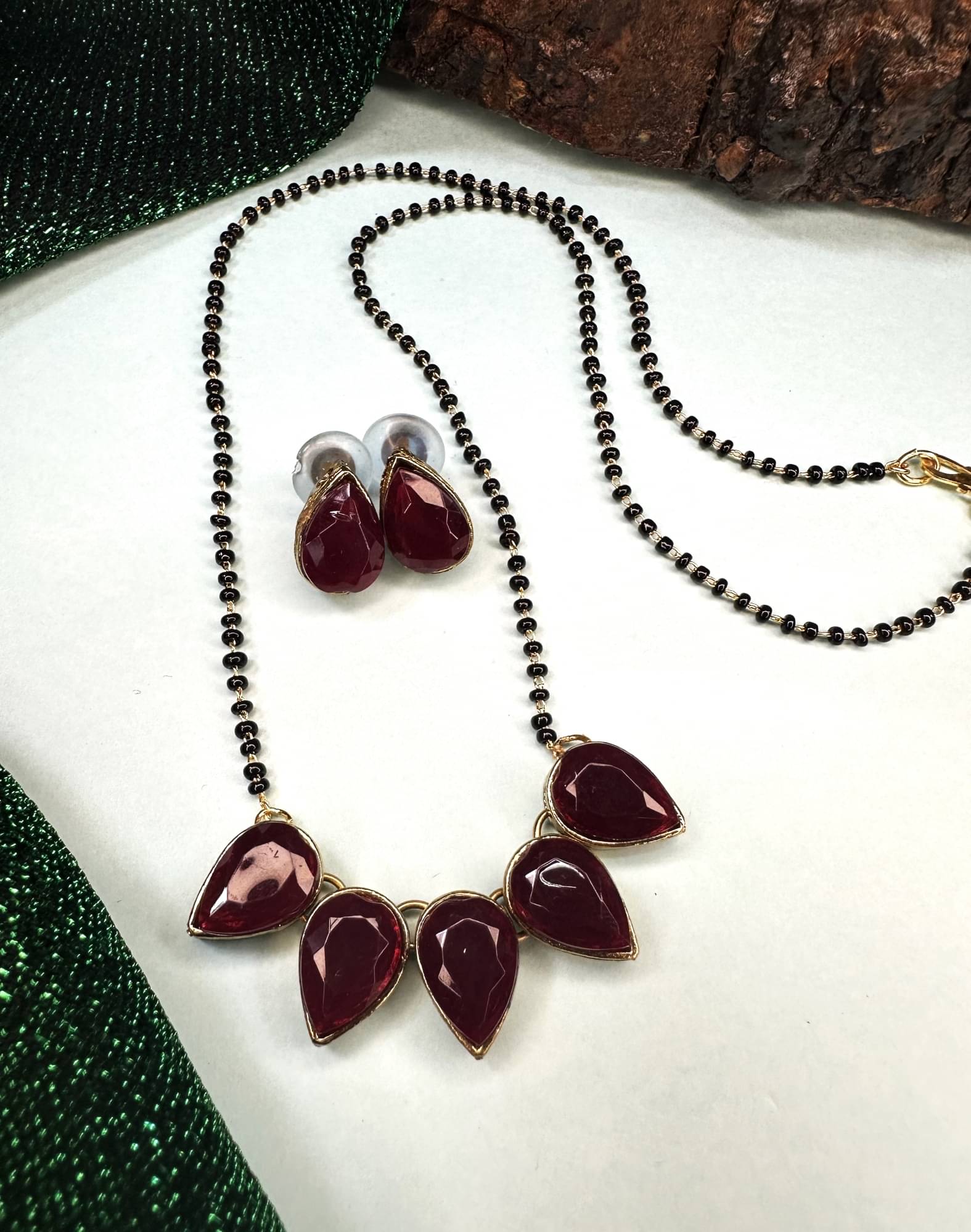 JN HANDICEAFT Maroon Mangalsutra Set ( Pack of 1 )     			JN HANDICEAFT Maroon Mangalsutra Set ( Pack of 1 )