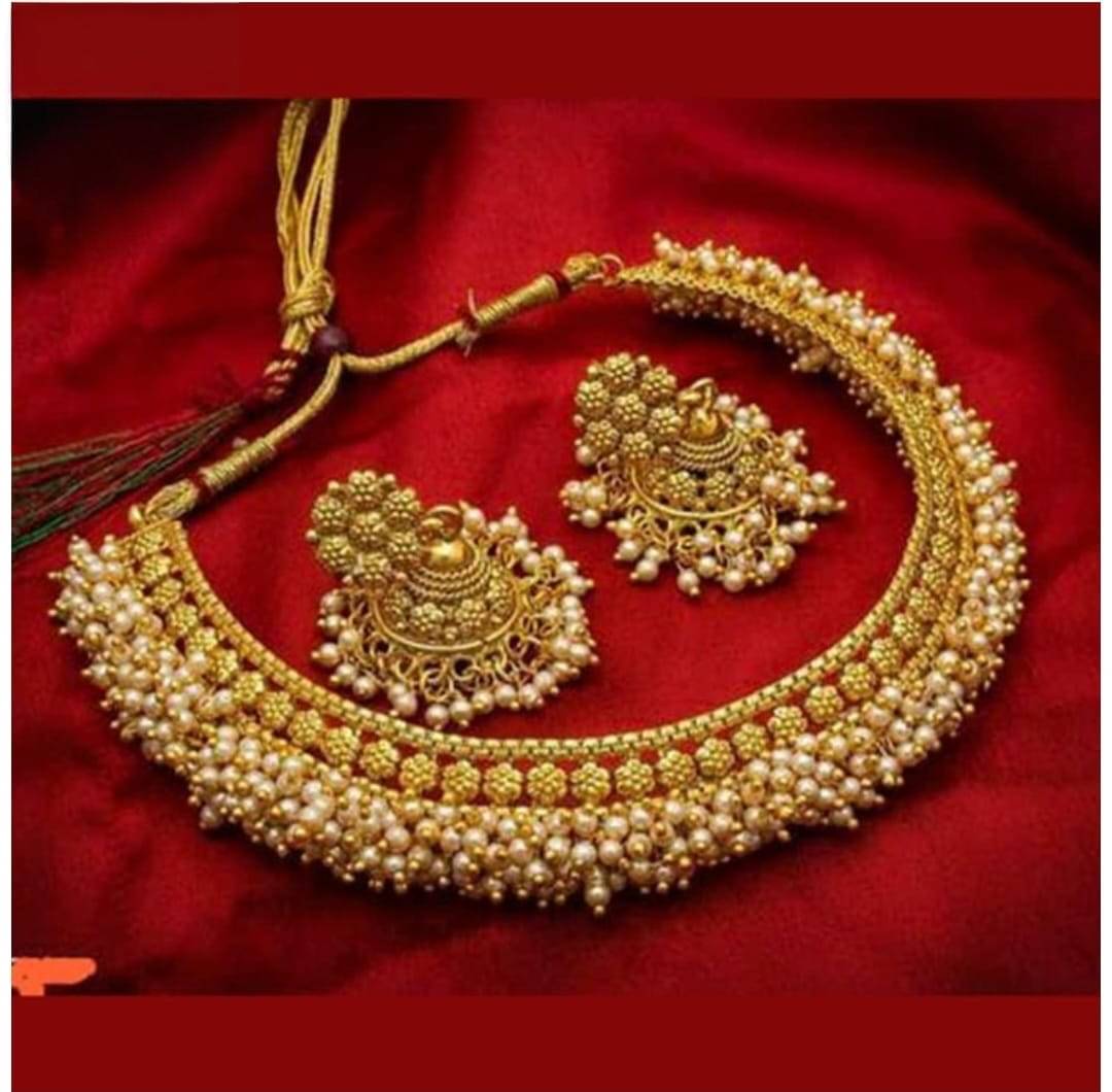     			LITRIK Golden Copper Necklace Set ( Pack of 1 )