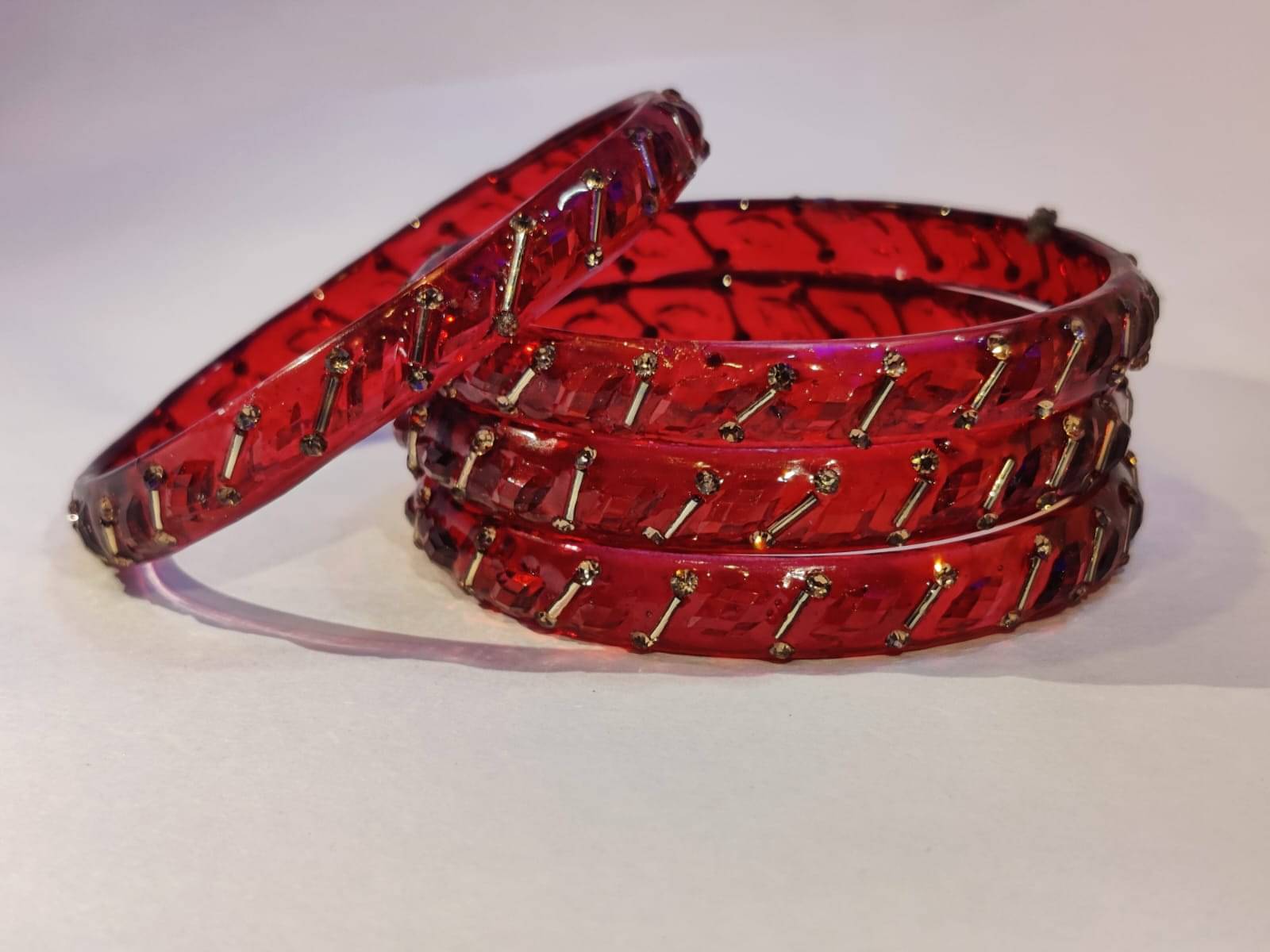 Divine Glass Maroon Bangle Set ( Pack of 4 ) Divine Glass Maroon Bangle Set ( Pack of 4 )