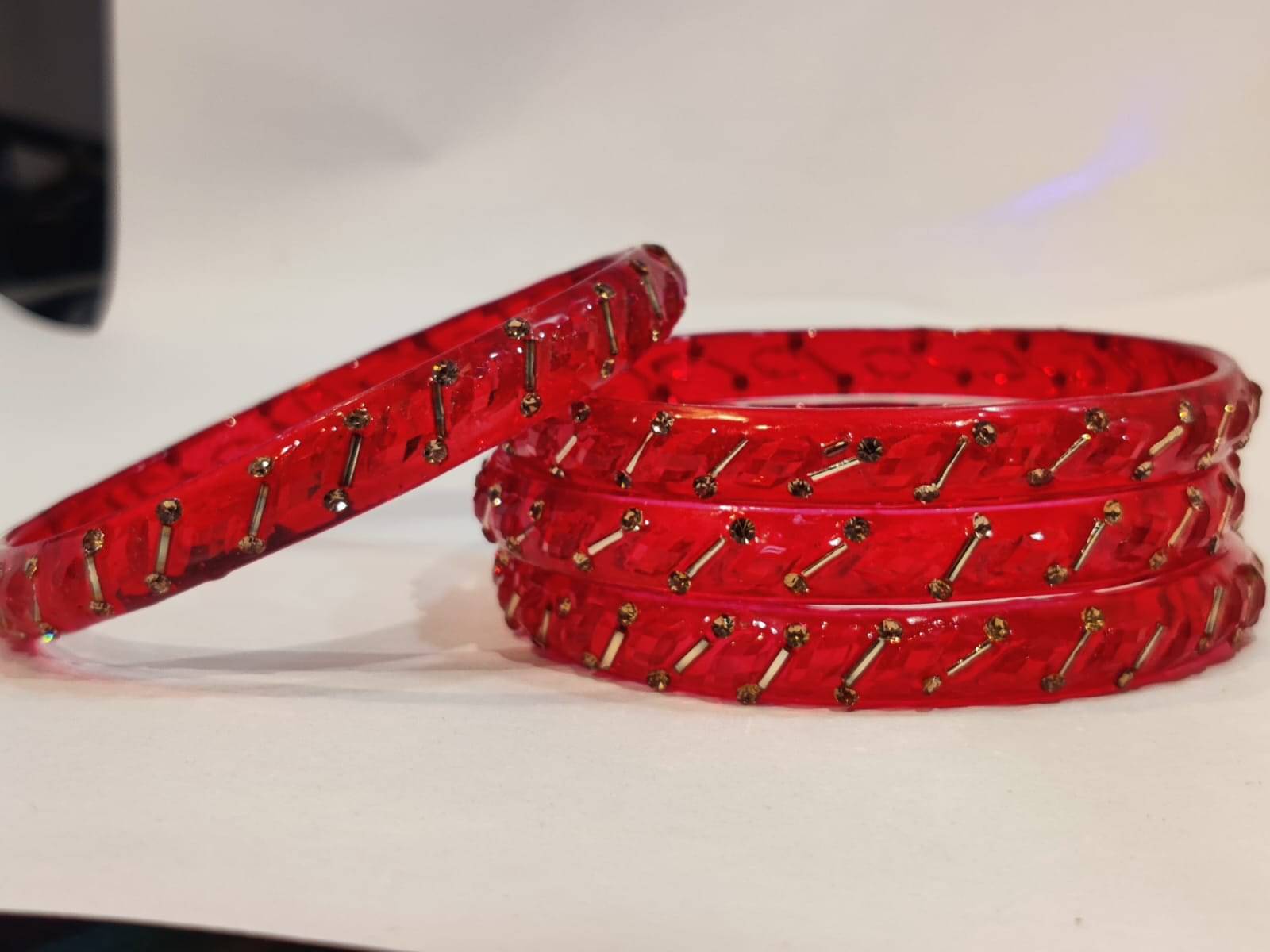 Divine Glass Red Bangle Set ( Pack of 4 ) Divine Glass Red Bangle Set ( Pack of 4 )