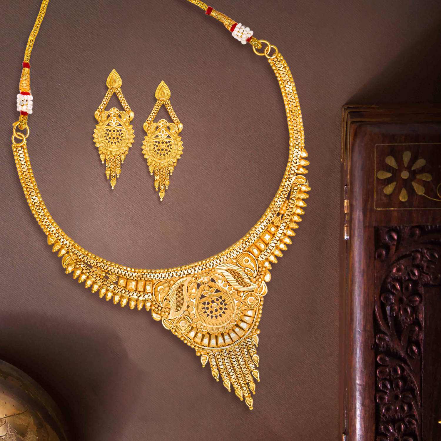     			Drashti Collection Golden Brass Necklace Set ( Pack of 1 )