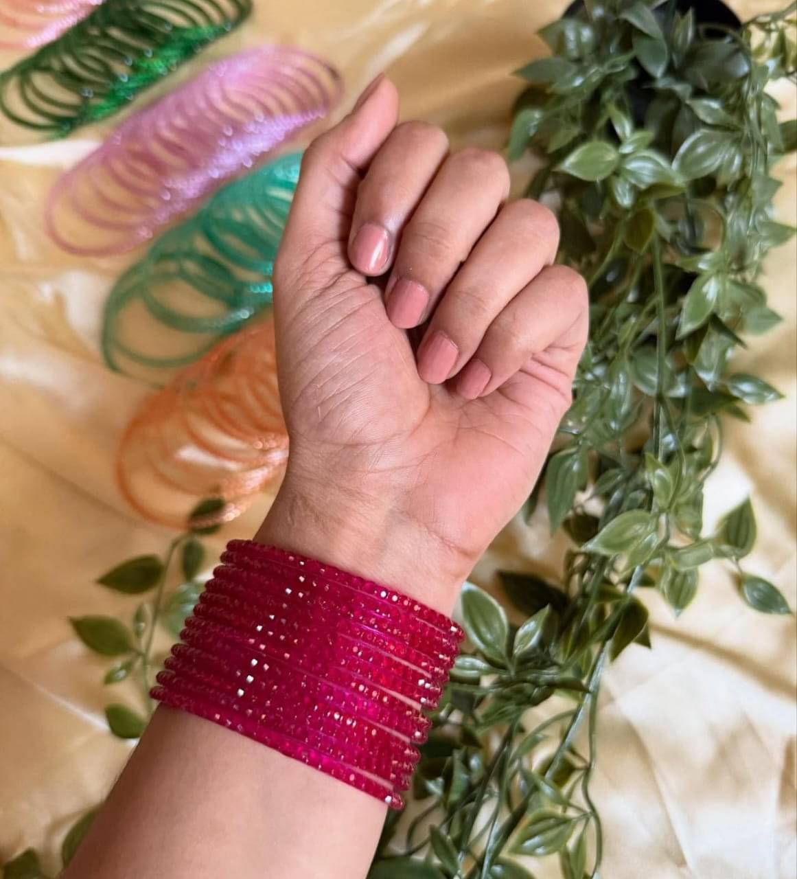 Divine Glass Magenta Bangle Set ( Pack of 12 ) Divine Glass Magenta Bangle Set ( Pack of 12 )