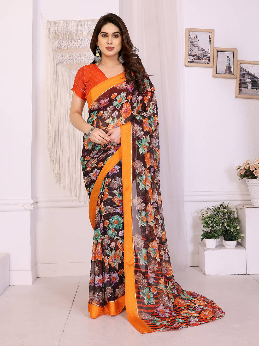 Kashvi Sarees Georgette Printed Regular Saree With Unstitched Blouse Piece ( Brown )     			Kashvi Sarees Georgette Printed Regular Saree With Unstitched Blouse Piece ( Brown )