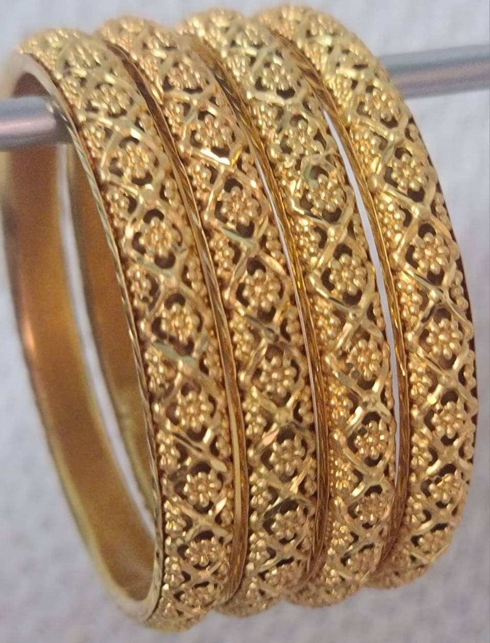 Iivaas Gold Bangle ( Pack of 4 ) Iivaas Gold Bangle ( Pack of 4 )
