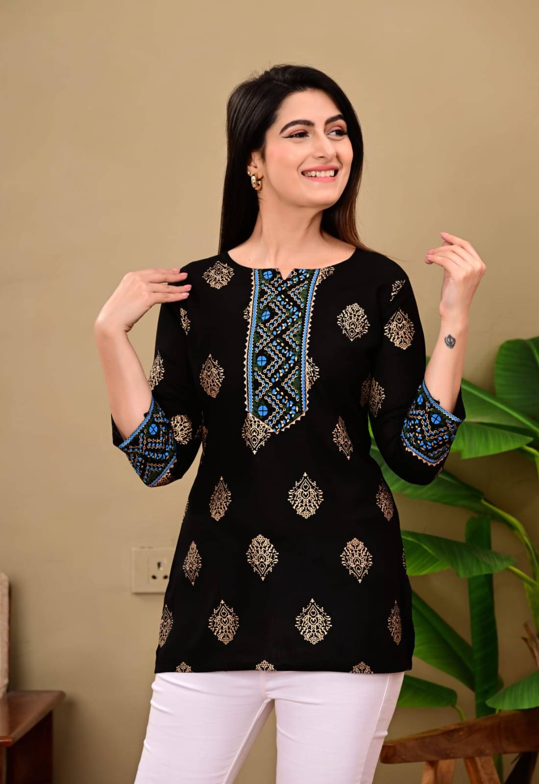     			PRIYA GARMNETS Women's Rayon Regular Top ( Black )