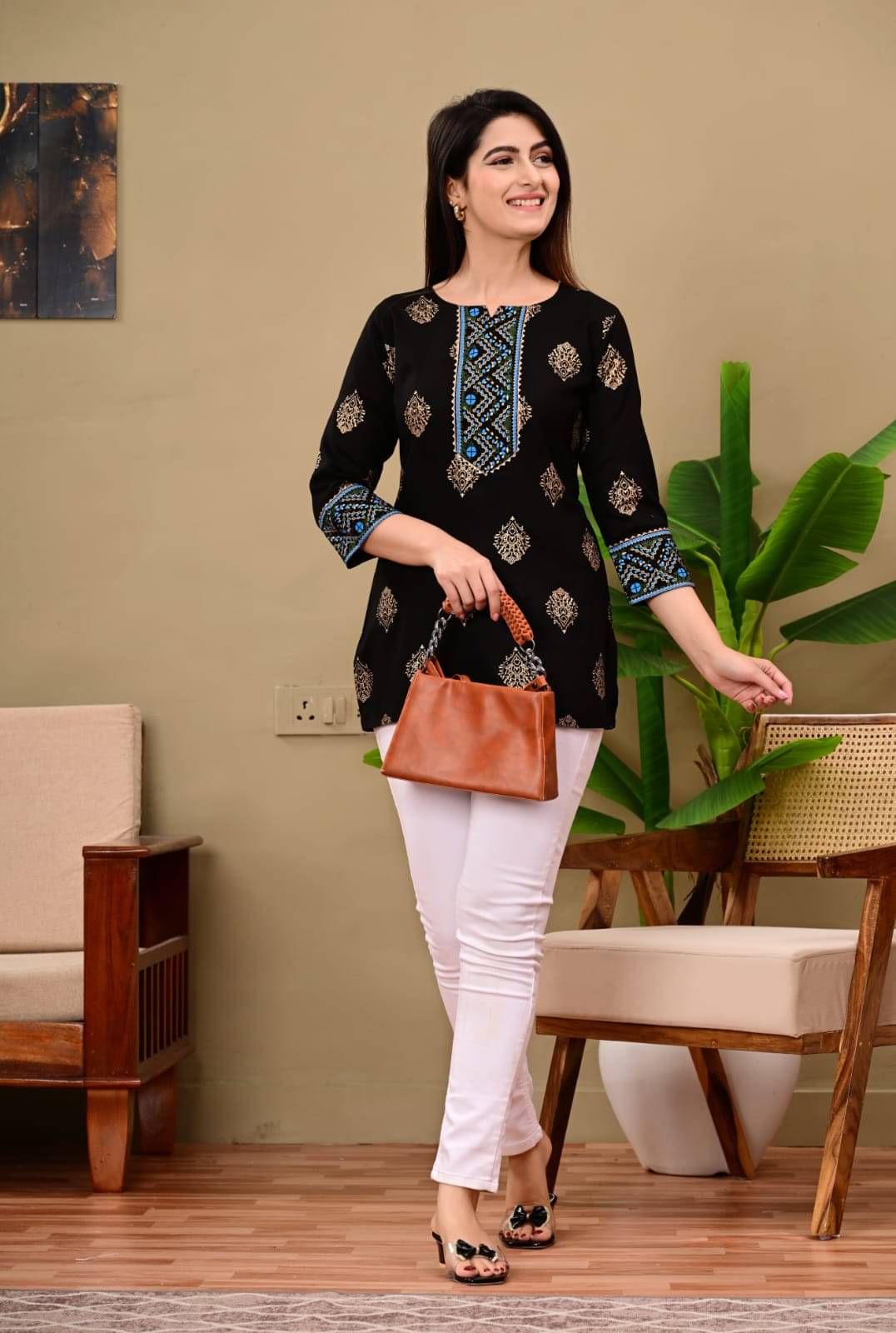    			PRIYA GARMNETS Women's Rayon Regular Top ( Black )