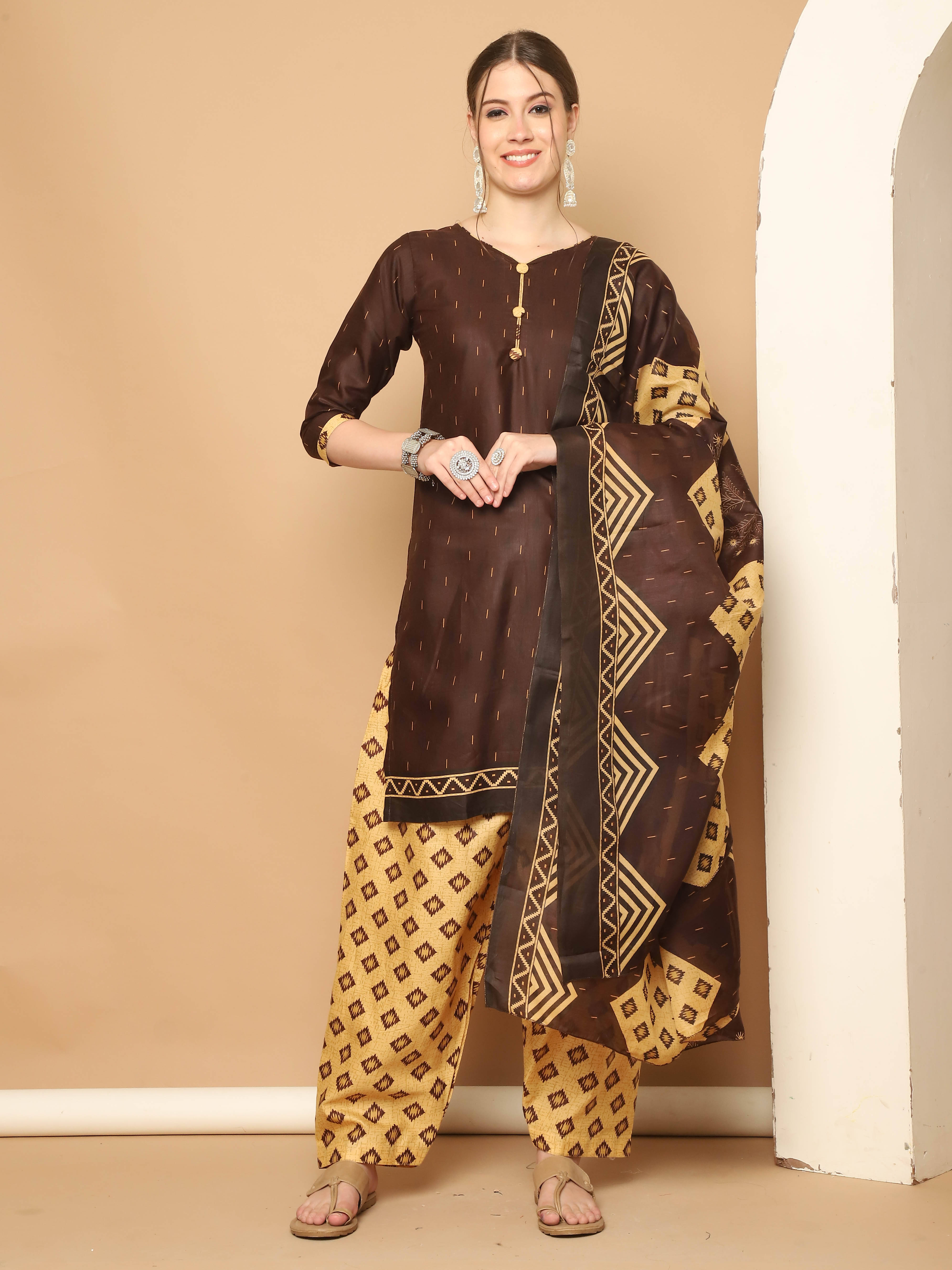    			Rajnandini Women Cotton Blend Printed Straight Kurti With Patiala Salwar ( Brown )