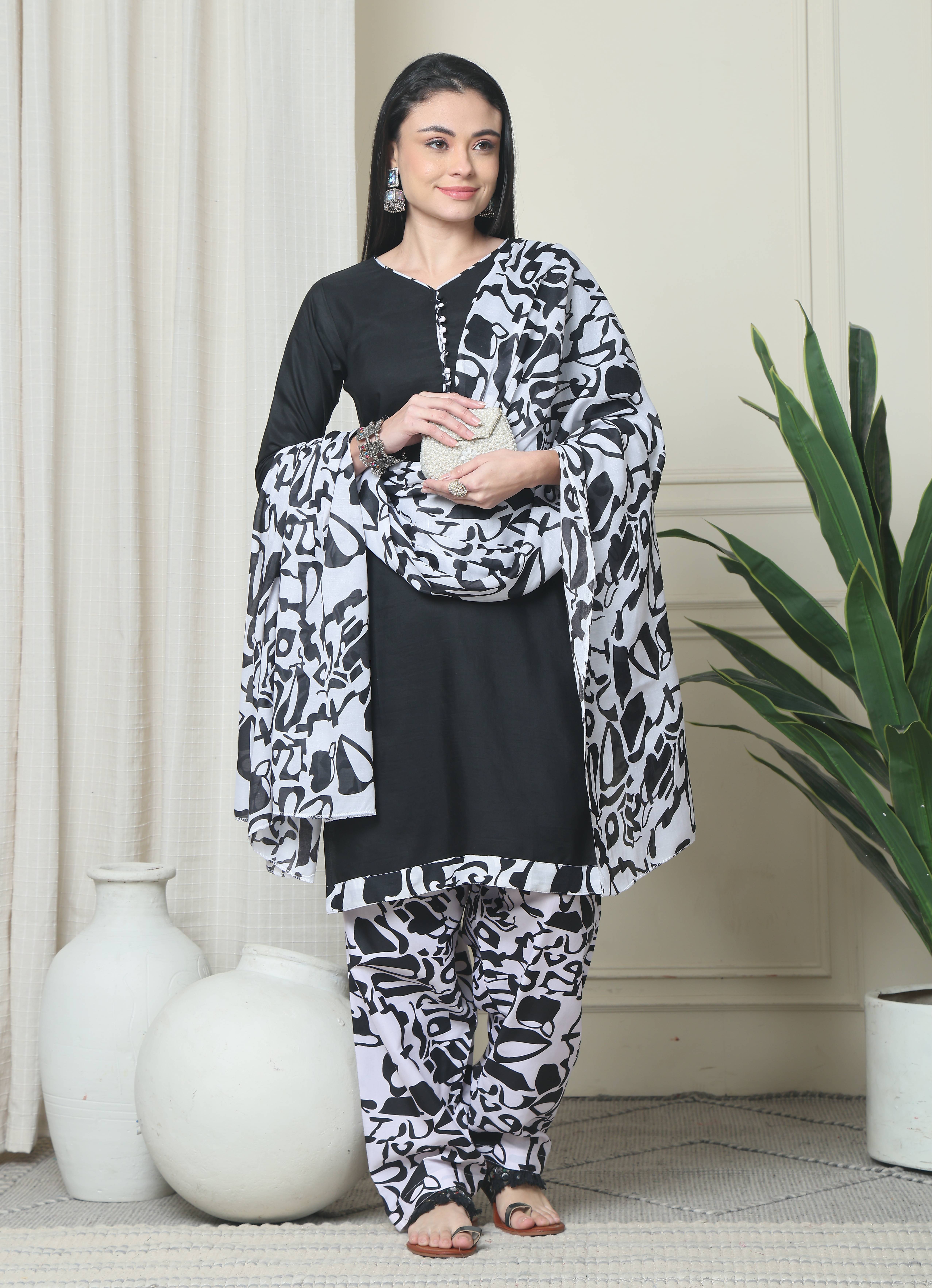 Wonder Weaves Women Cotton Blend Printed Straight Kurti With Patiala Salwar ( Black )     			Wonder Weaves Women Cotton Blend Printed Straight Kurti With Patiala Salwar ( Black )