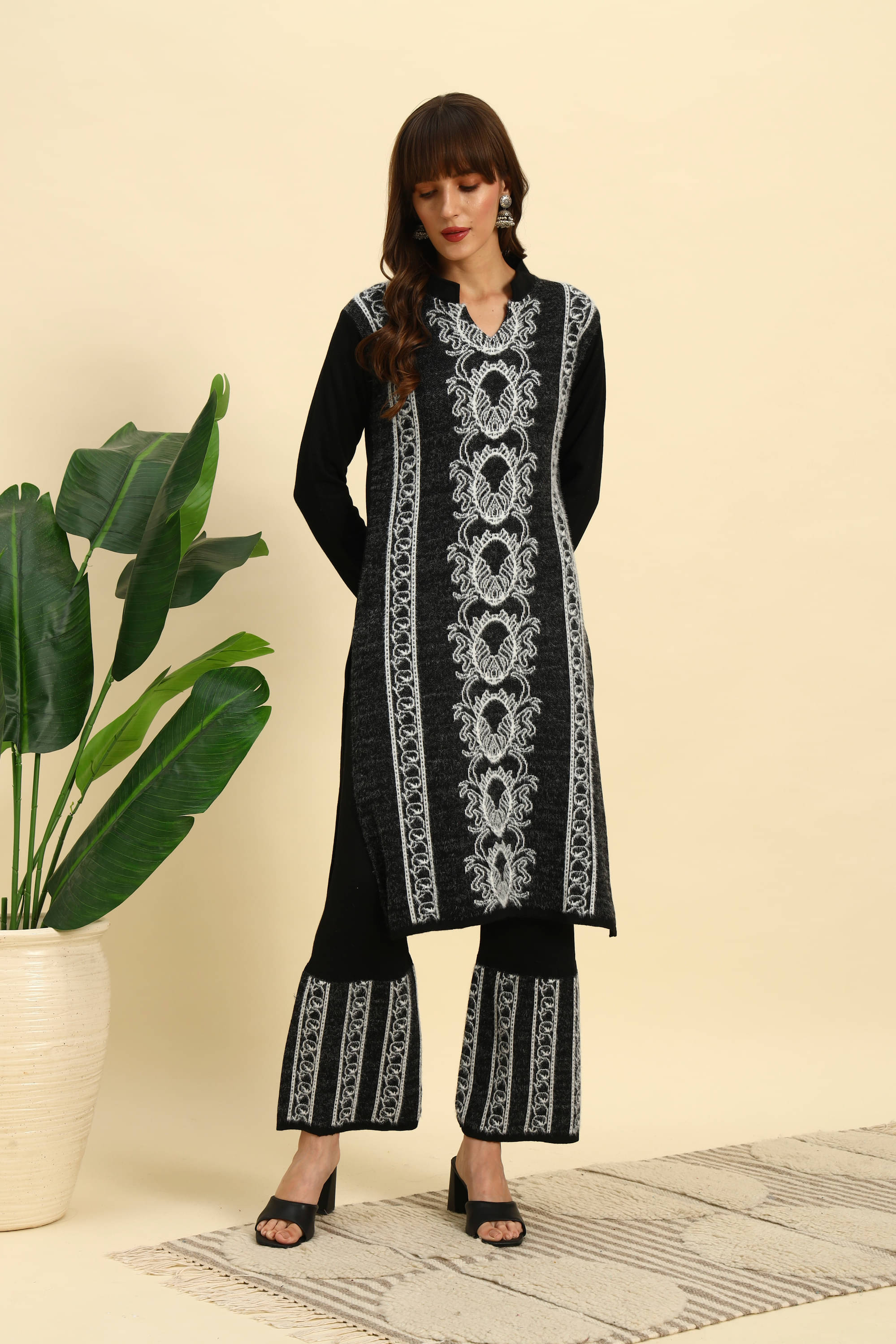 Canblar Women Woollen Striped Straight Kurti With Palazzo ( Black ) Canblar Women Woollen Striped Straight Kurti With Palazzo ( Black )