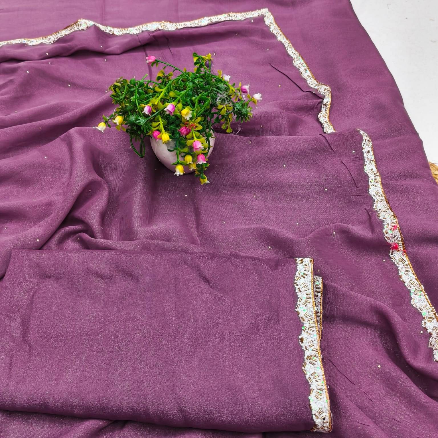     			Madhav Art Georgette Solid Regular Saree With Unstitched Blouse Piece ( Purple )