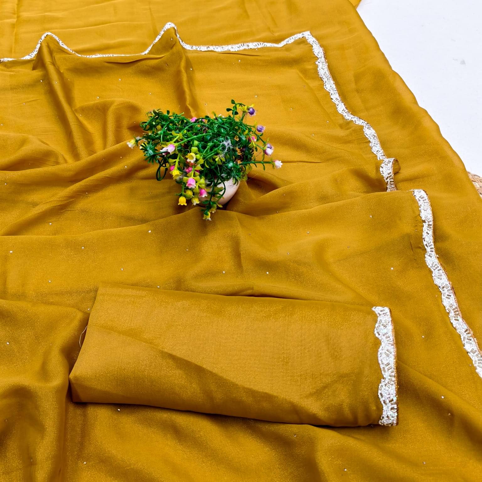 Madhav Art Georgette Solid Regular Saree With Unstitched Blouse Piece ( Yellow ) Madhav Art Georgette Solid Regular Saree With Unstitched Blouse Piece ( Yellow )