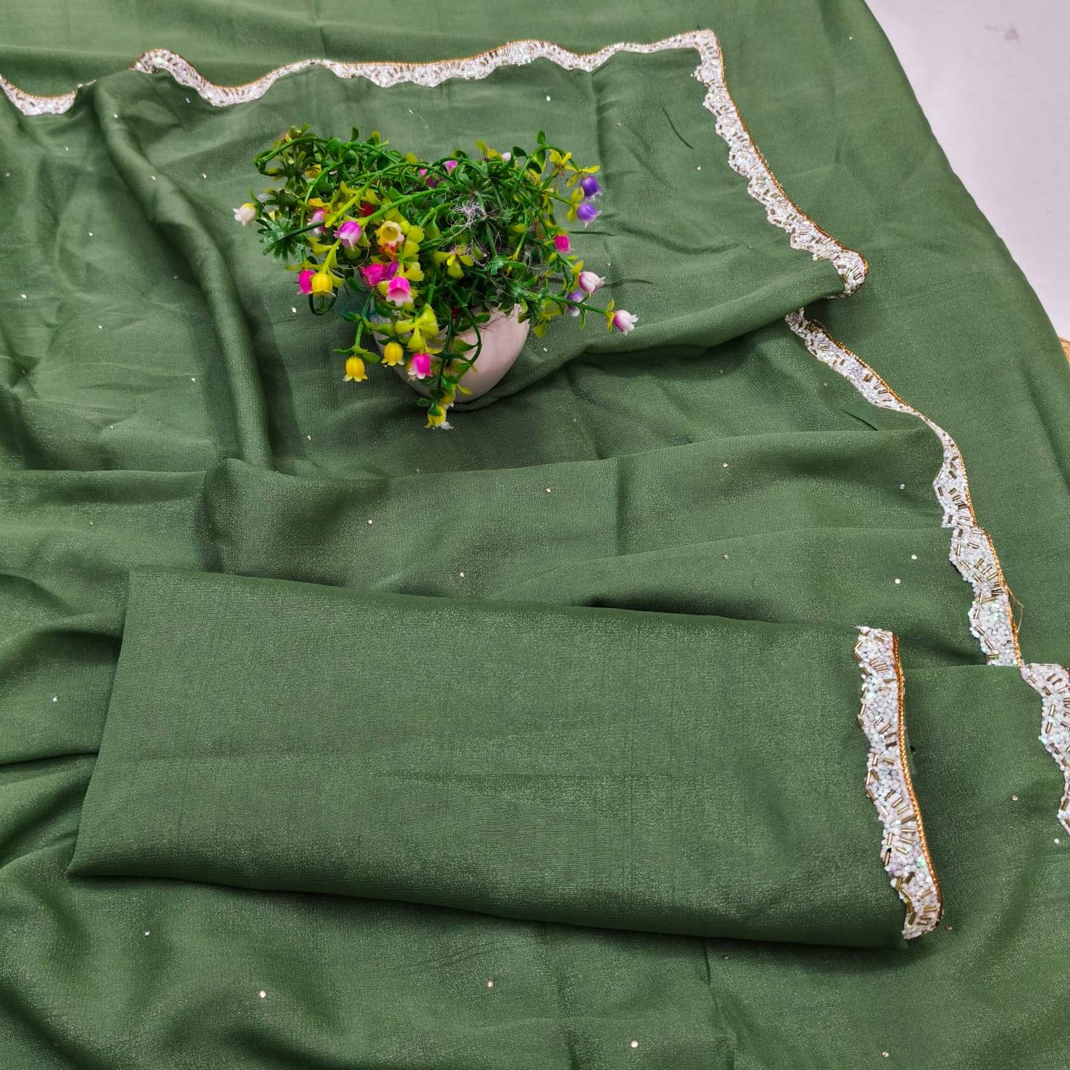     			Madhav Art Georgette Solid Regular Saree With Unstitched Blouse Piece ( Green )