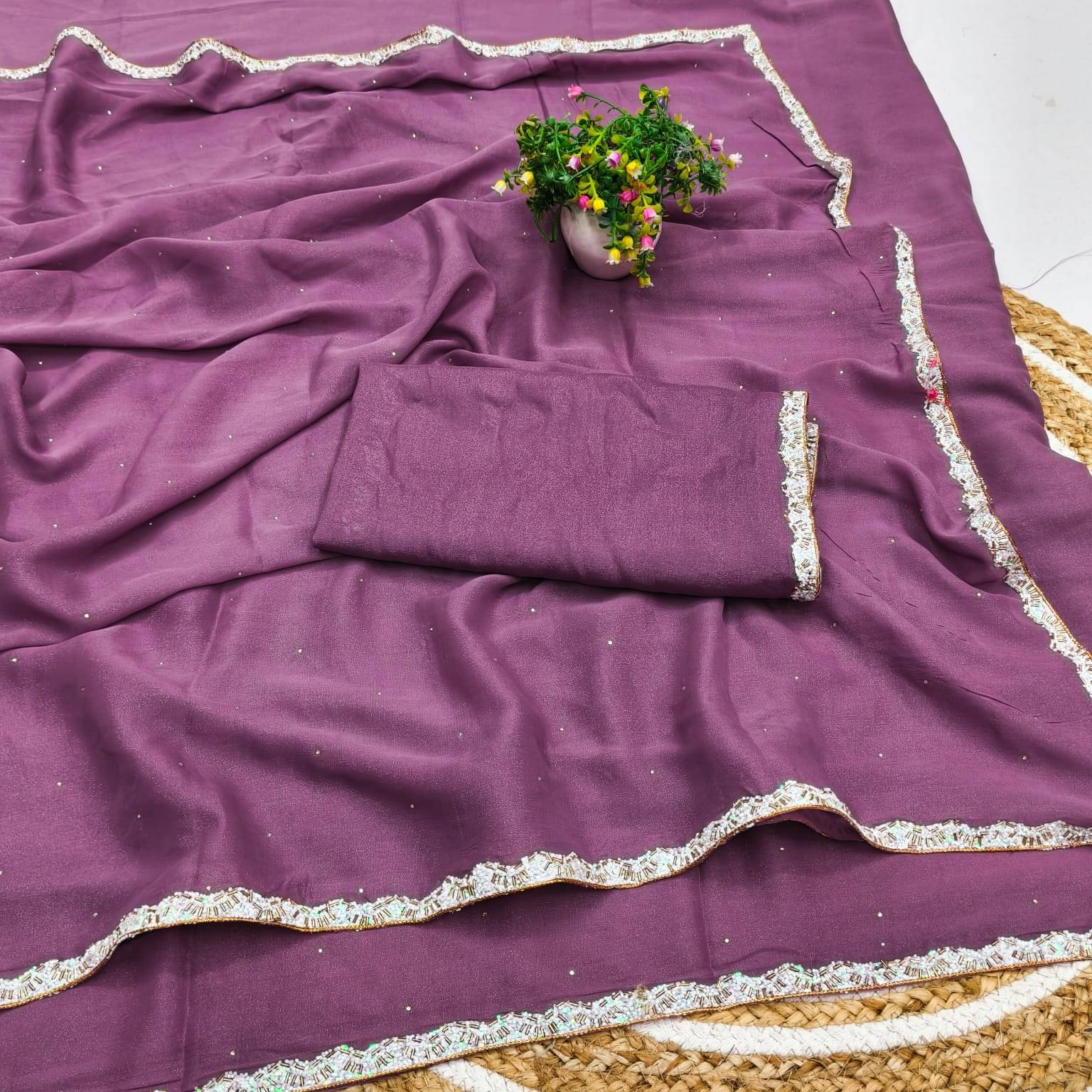     			Madhav Art Georgette Solid Regular Saree With Unstitched Blouse Piece ( Purple )