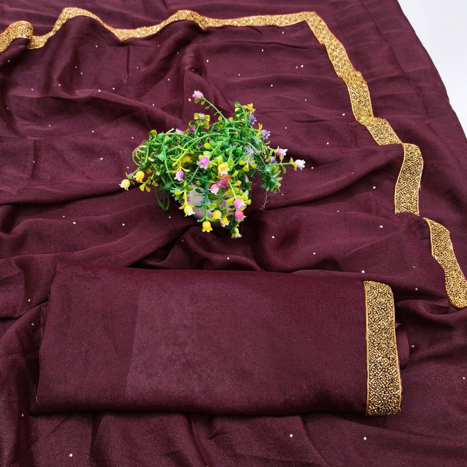     			Madhav Art Georgette Solid Regular Saree With Unstitched Blouse Piece ( Maroon )