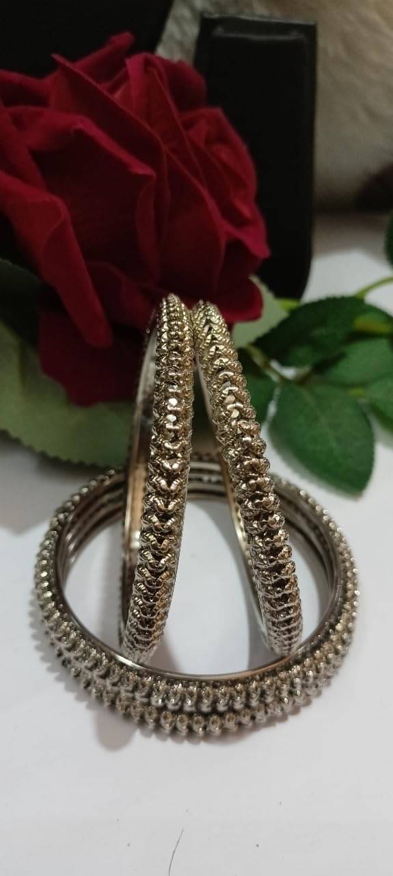 SAJSHRUNGAR JEWELLERY Silver Bangle Set ( Pack of 4 )     			SAJSHRUNGAR JEWELLERY Silver Bangle Set ( Pack of 4 )