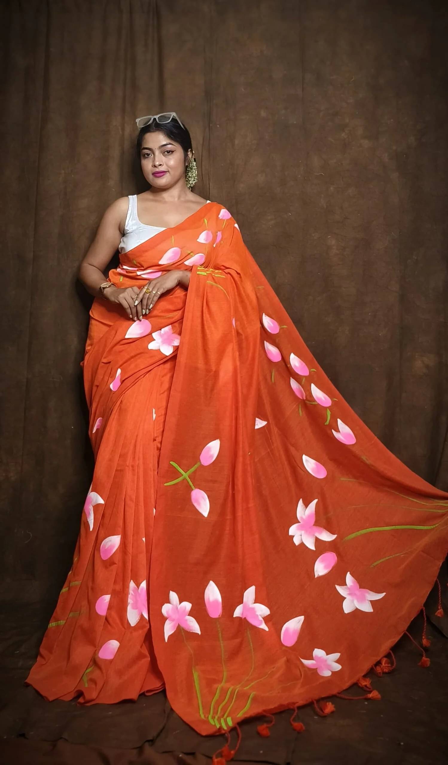     			Apnisha Linen Printed Regular Saree With Unstitched Blouse Piece ( Orange )